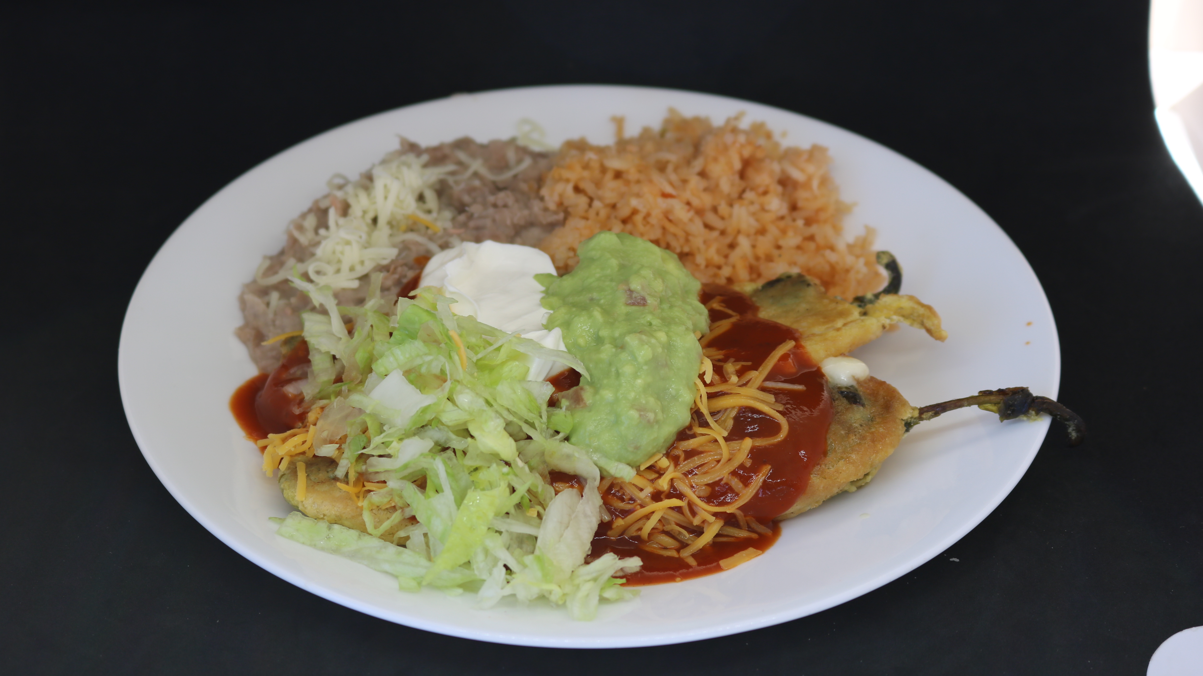 Order #15 - 2 Chile Rellenos food online from Albertaco's Mexican Food Inc store, Cypress on bringmethat.com