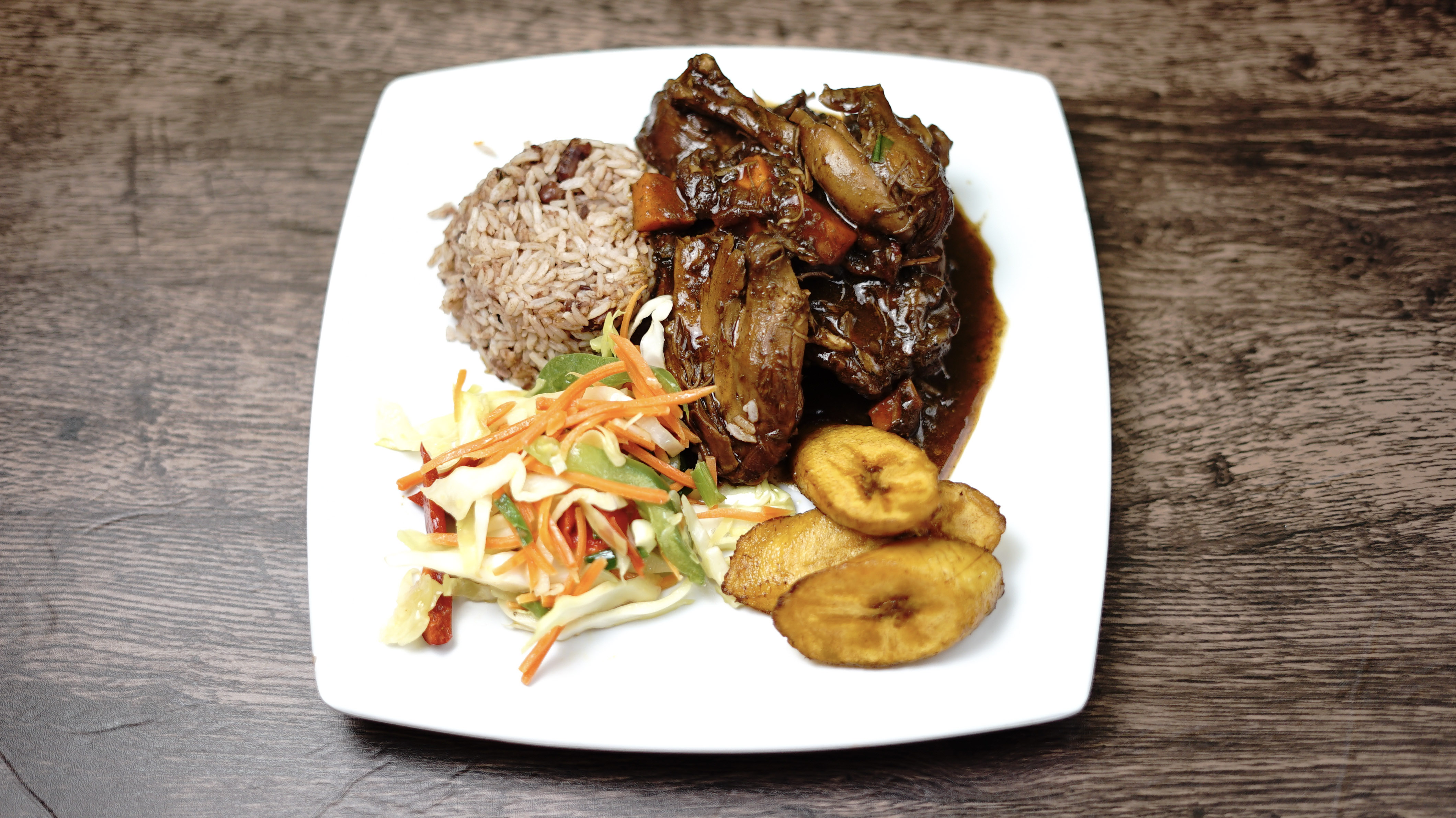 Order Brown Stew Chicken Dinner food online from Yaad Style Jamaican Cuisine store, Portland on bringmethat.com