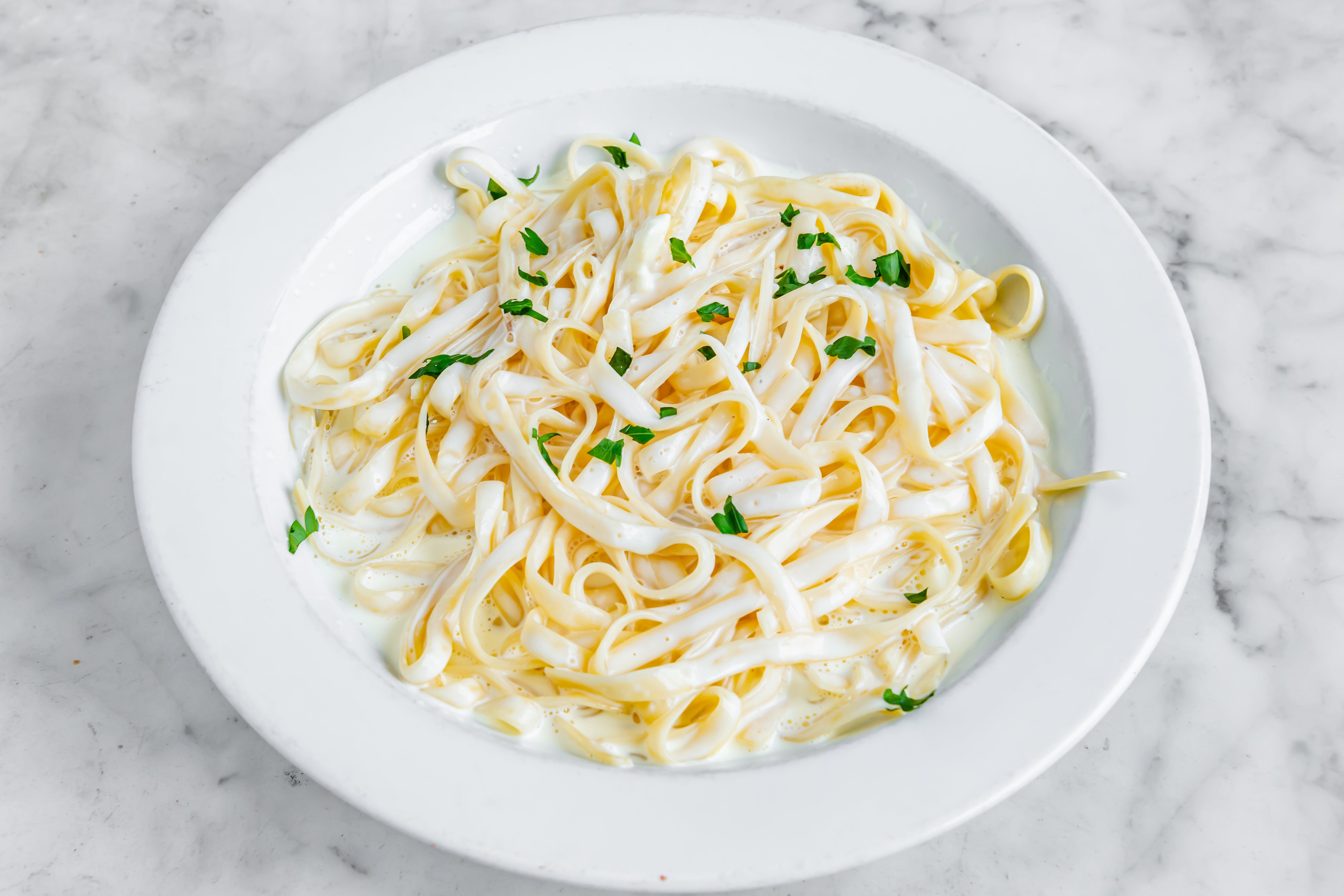 Order Fettuccine Alfredo - Pasta food online from Corato pizza i catering store, Ridgewood on bringmethat.com
