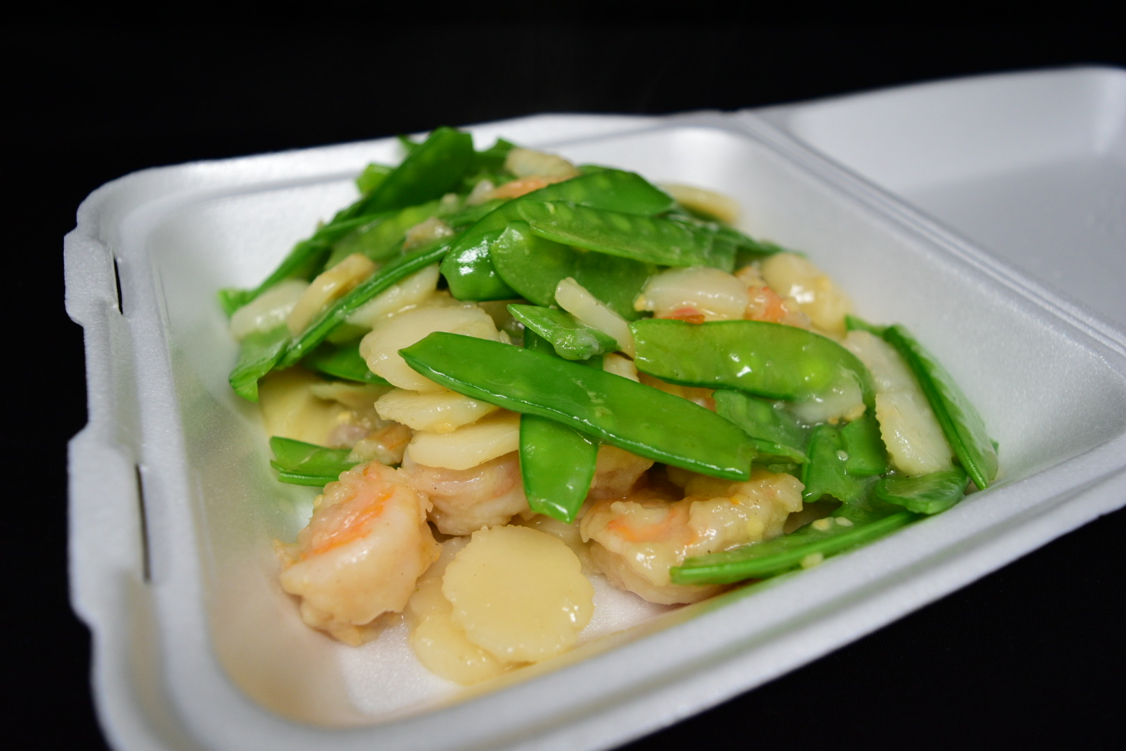 Order 71. Com Tom Xao Dau Hoa Lan/Shrimp & Snow Peas in Rich Gravy food online from Fortune Star Cuisine store, Reno on bringmethat.com