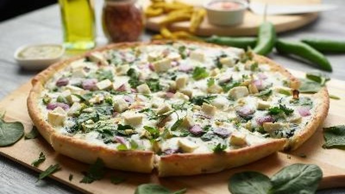 Order Palak Paneer pizza twist food online from Chicago's Pizza With A Twist store, Arlington on bringmethat.com