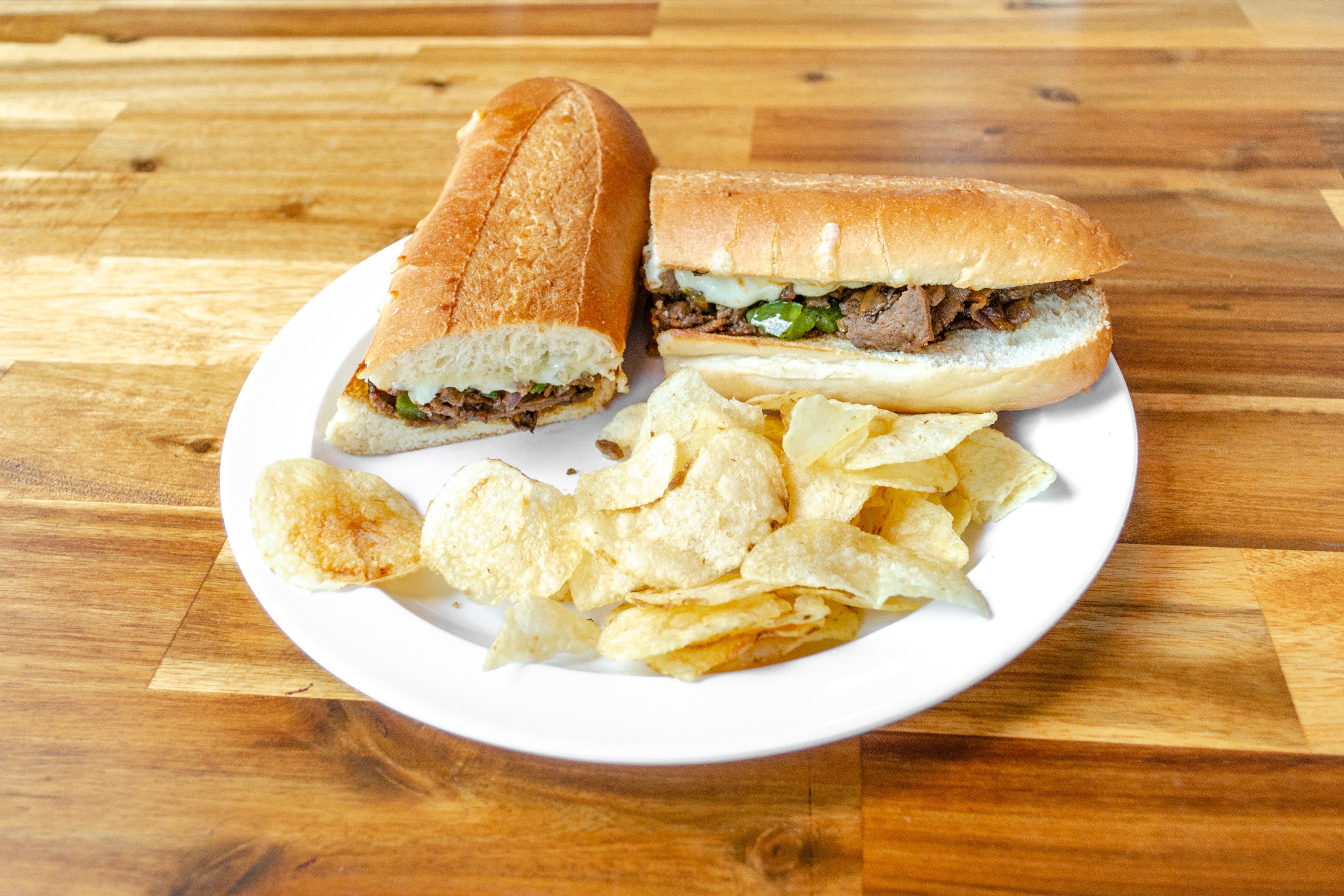 Order Philly Cheesesteak Sub - Sub food online from Rays Pizza store, Nashville on bringmethat.com