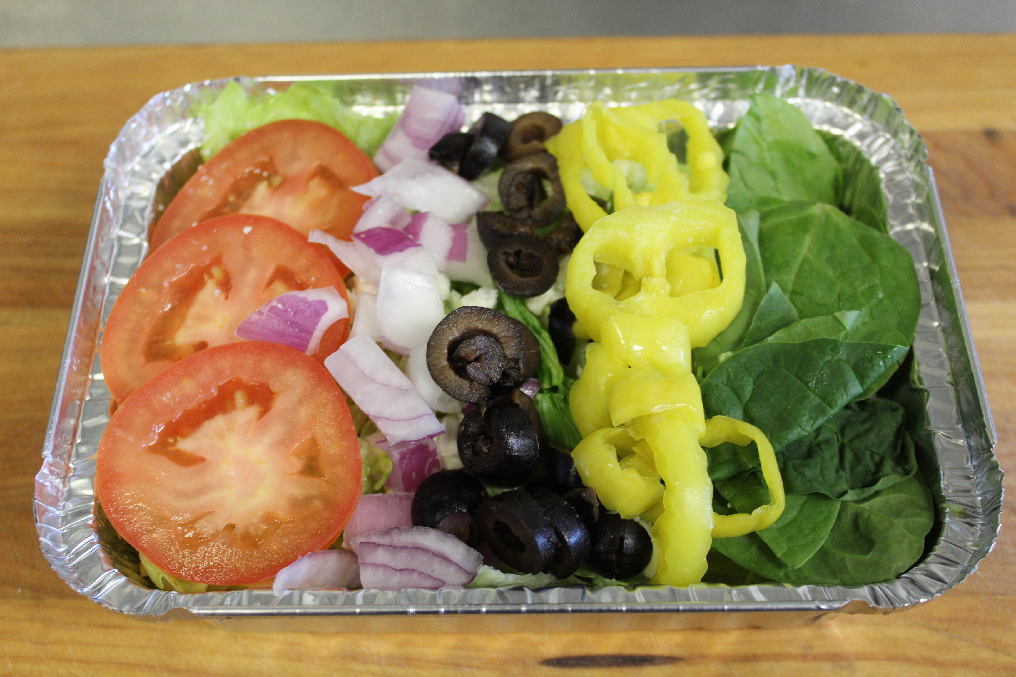 Order Greek Salad food online from Mama Mary Pizza store, Holland on bringmethat.com
