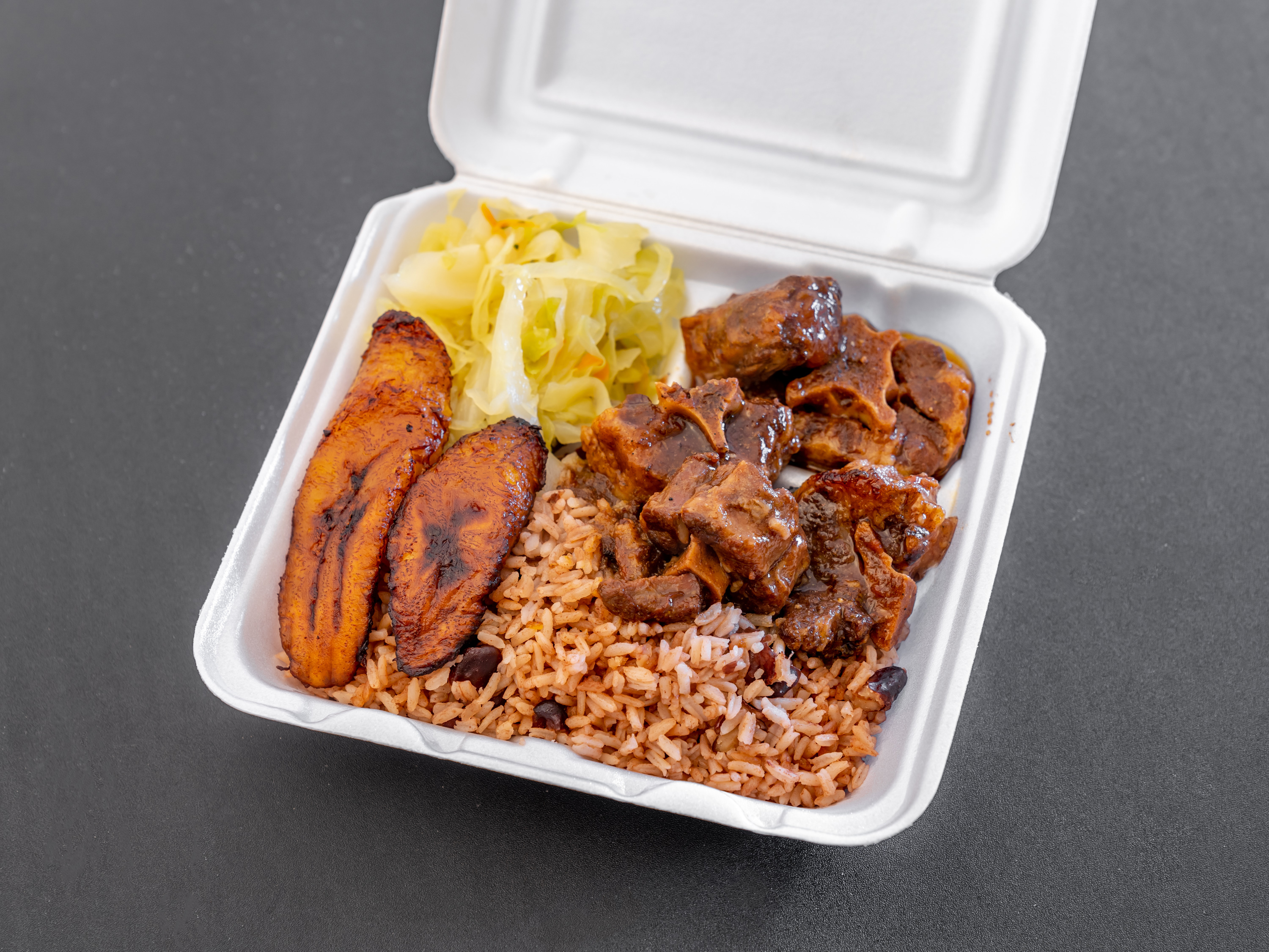 Order Oxtails food online from Tip Top Willows store, Jonesboro on bringmethat.com