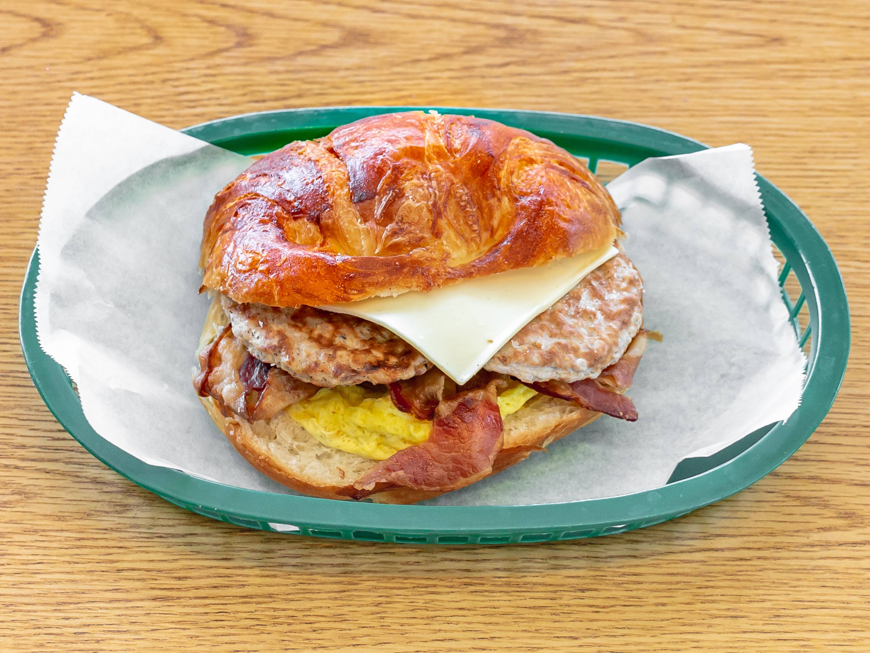 Order 11. Sausage, Bacon, Egg & Cheese Sandwich food online from Evergreen Donut store, San Jose on bringmethat.com