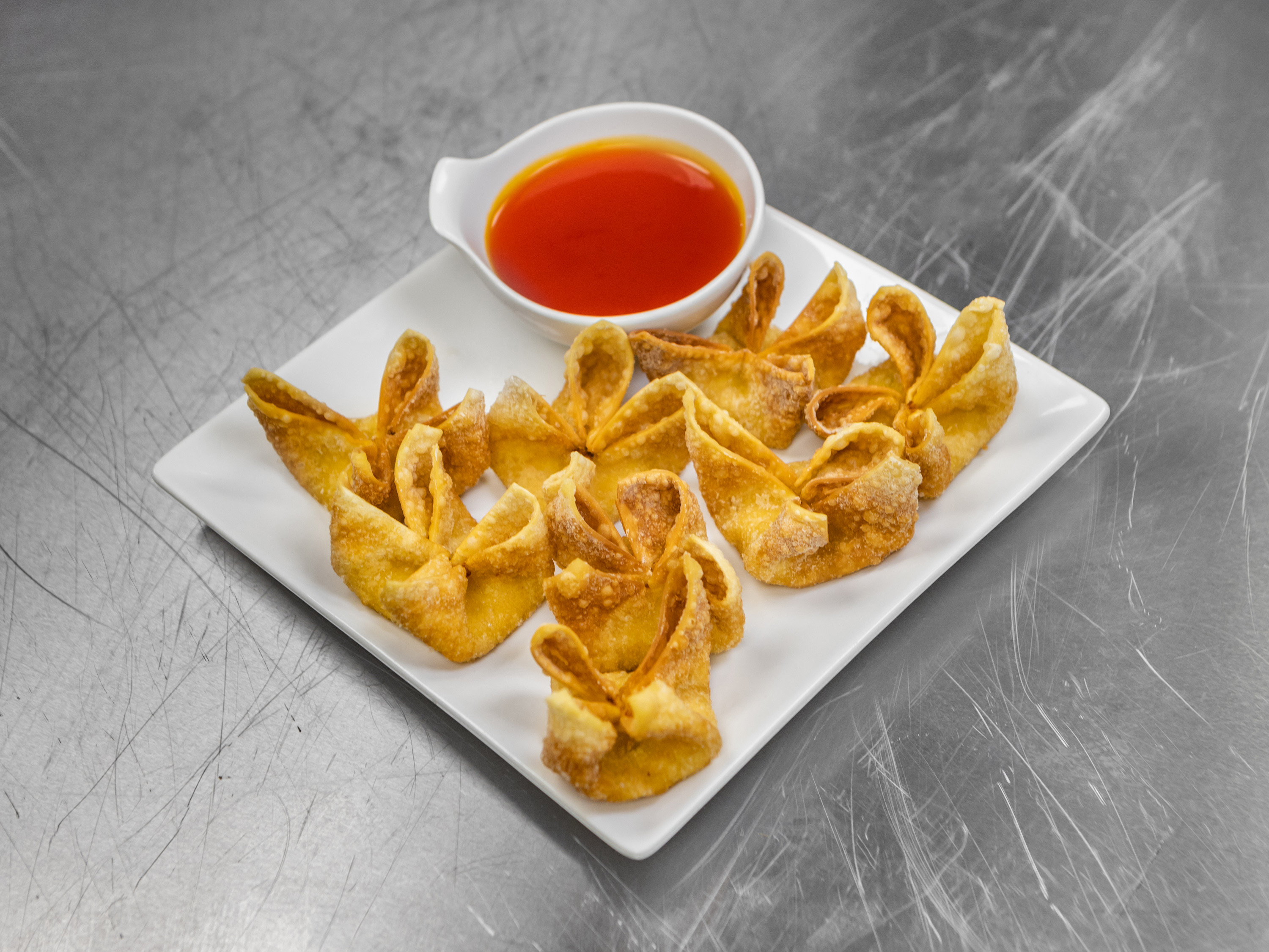 Order 8 Pieces Crab Rangoons food online from Red Lotus Asian Grille store, Austin on bringmethat.com