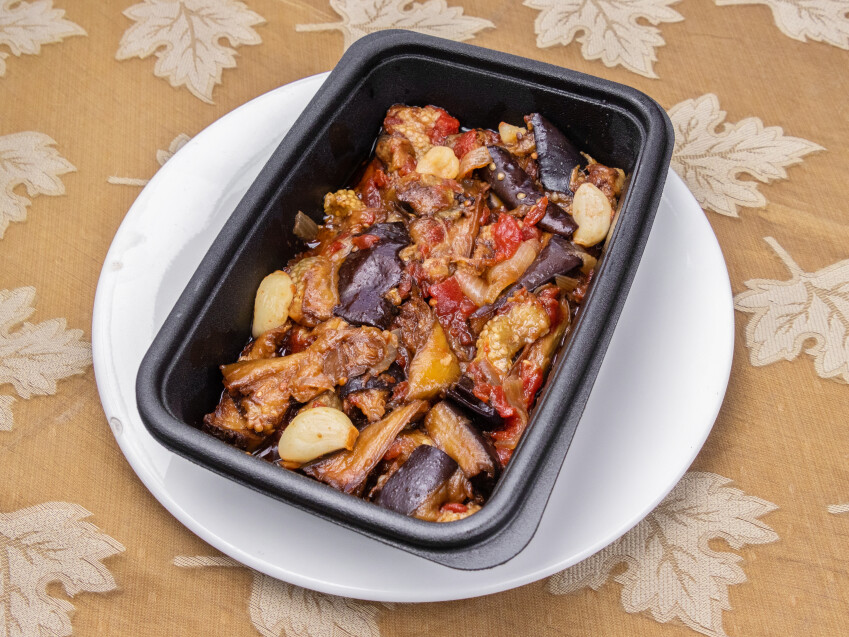 Order 16 oz. Eggplant and Red Pepper Casserole  food online from Leon International Foods store, Doraville on bringmethat.com