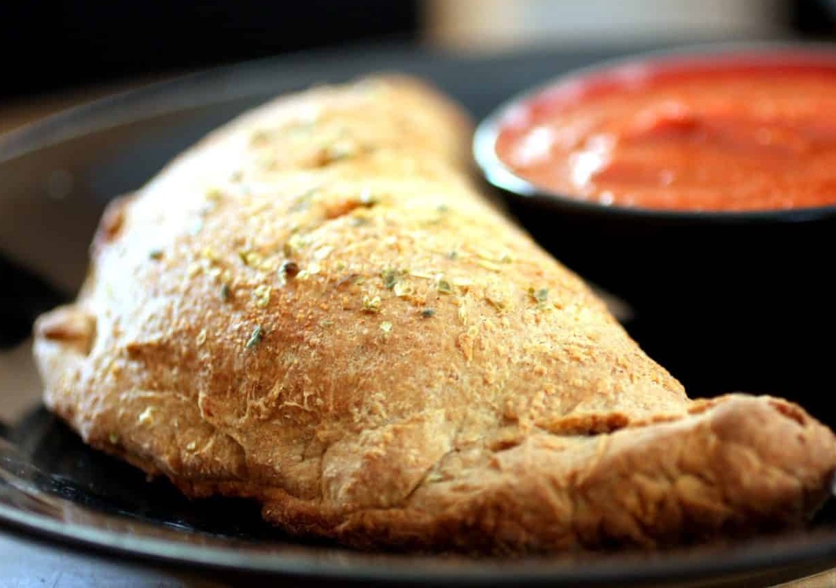 Order Calzone food online from Leaning Tower Pizza & Pasta store, Sherman Oaks on bringmethat.com