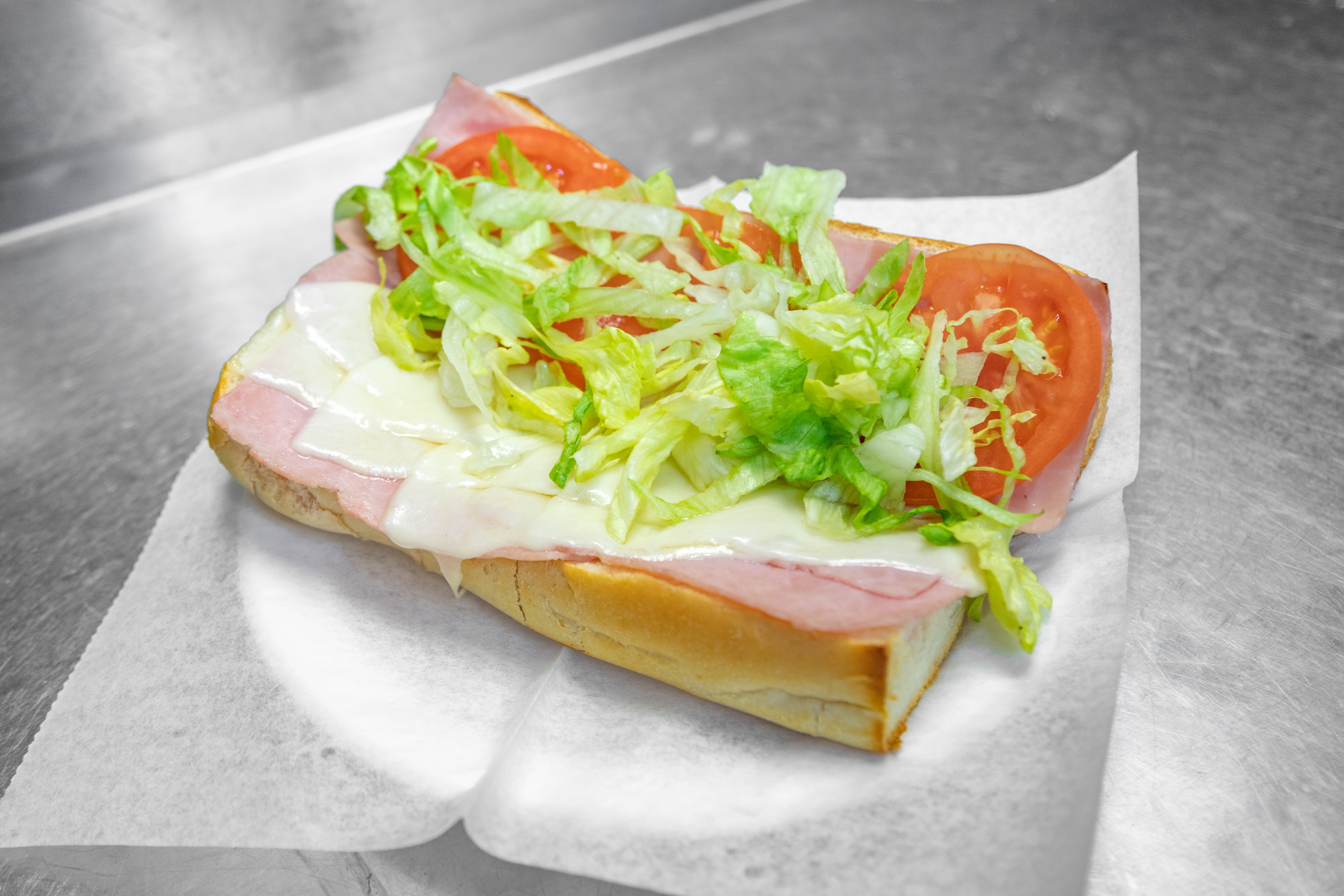 Order Ham Grinder - Half food online from Campus Pizza store, Hartford on bringmethat.com