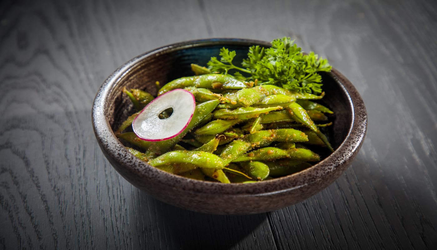 Order S22. Garlic Butter Edamame food online from Starfish Sushi store, Downey on bringmethat.com