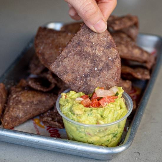 Order Puff Chips w/ Guacamole food online from Taco Rock store, Falls Church on bringmethat.com