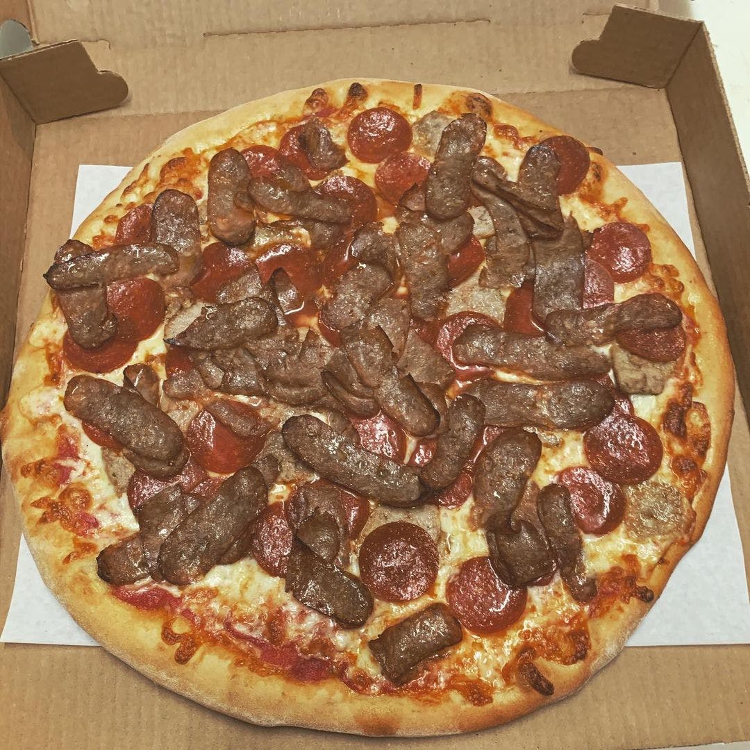 Order Meat Lovers Pizza - Medium 14" food online from Portofino Restaurant store, New Fairfield on bringmethat.com