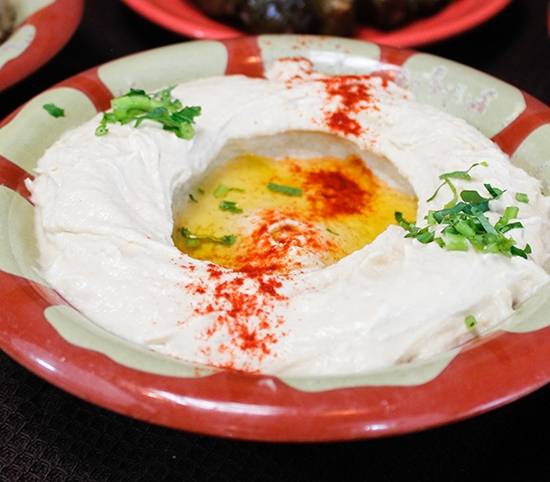 Order Hummus food online from Sunnin Lebanese Cafe store, Los Angeles on bringmethat.com