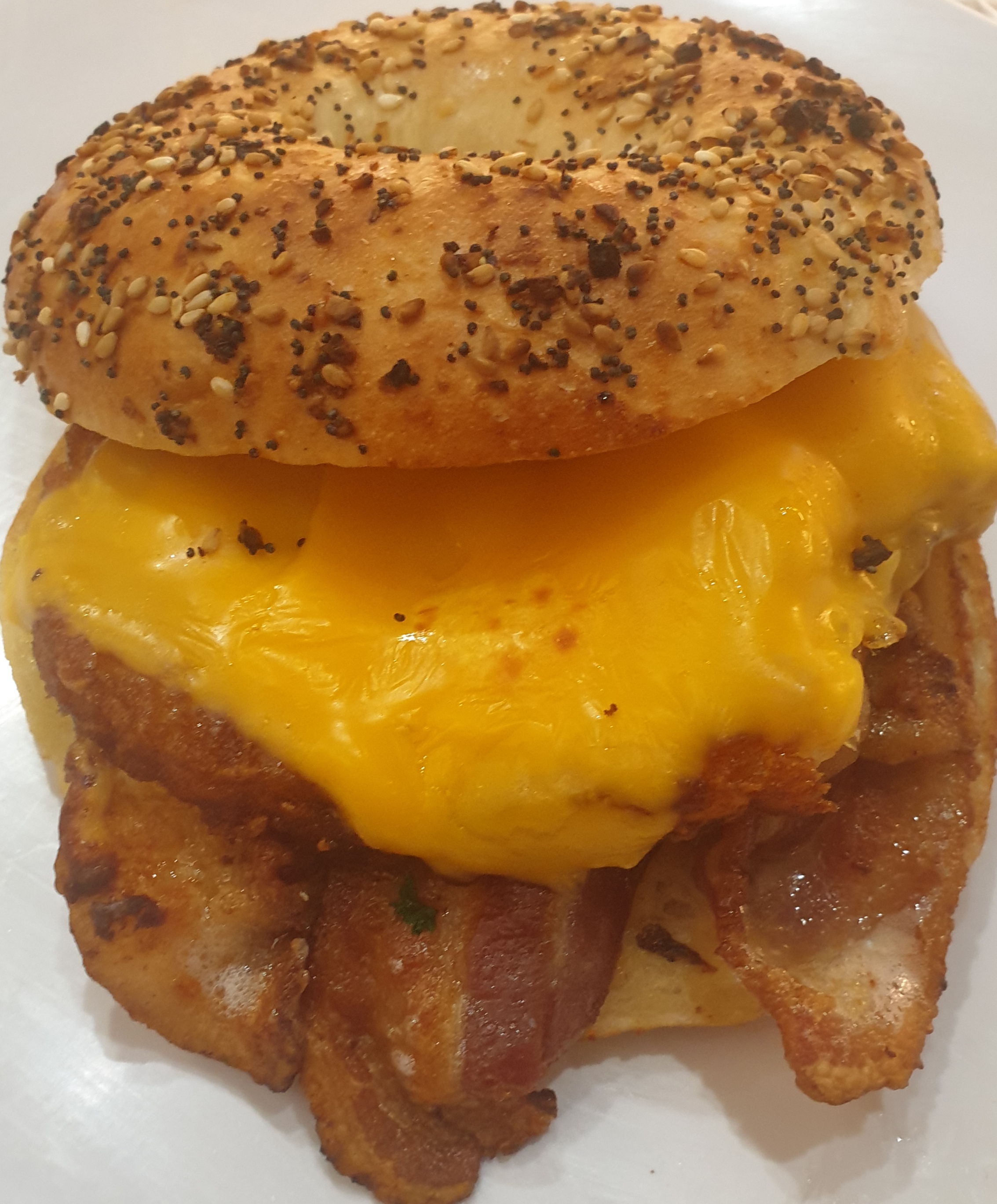 Order Bacon Hash Brown & melted american Cheese on BAGEL NO EGGS food online from Taz Cafe store, New York on bringmethat.com