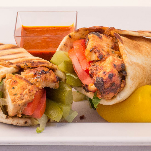 Order B8. Chicken Tikka Kabob Sandwich food online from Zamani Grill store, Conroe on bringmethat.com