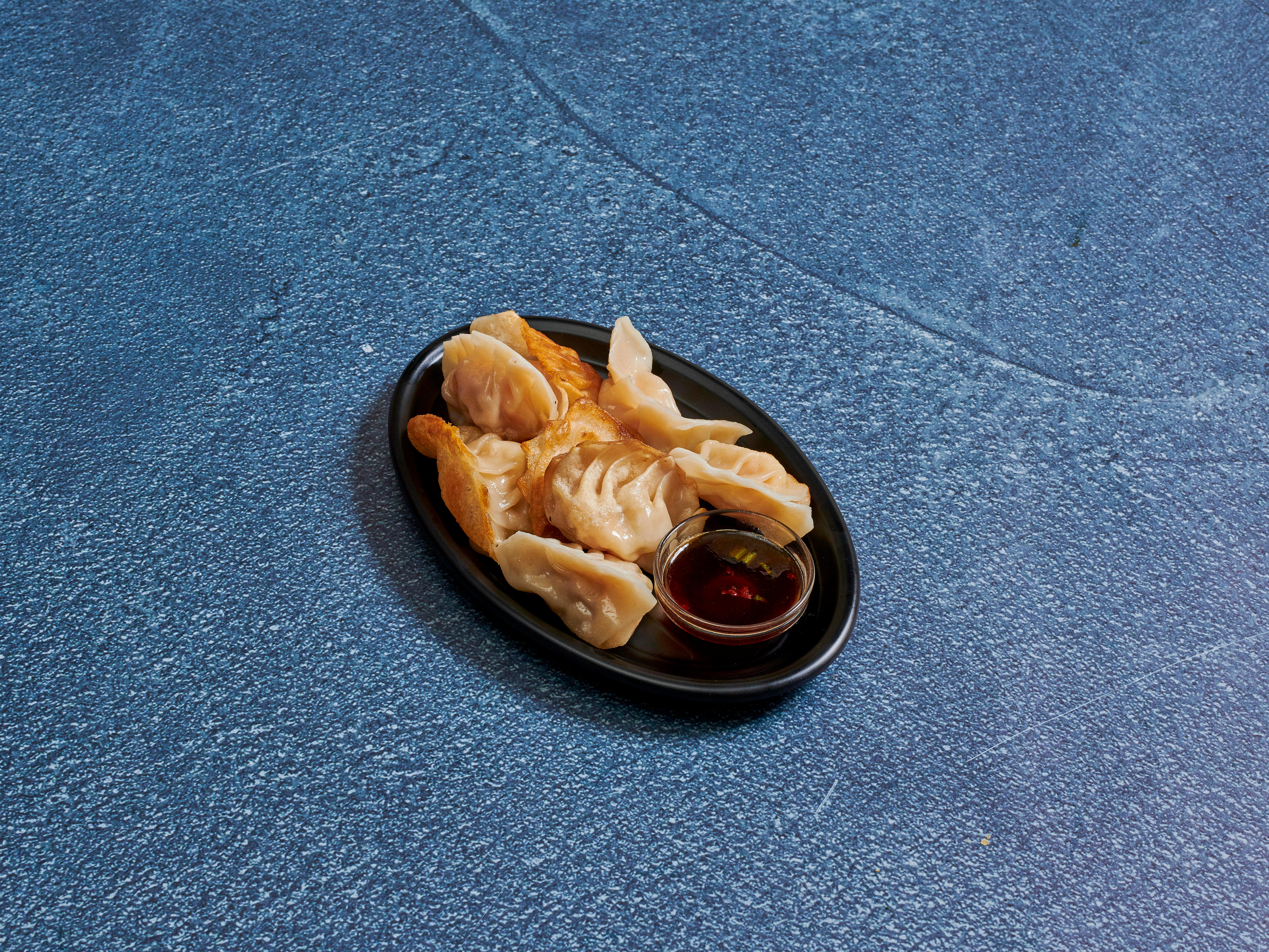 Order 15. Pan Fried Wonton food online from Empire Chinese Restaurant store, Fresh Meadows on bringmethat.com