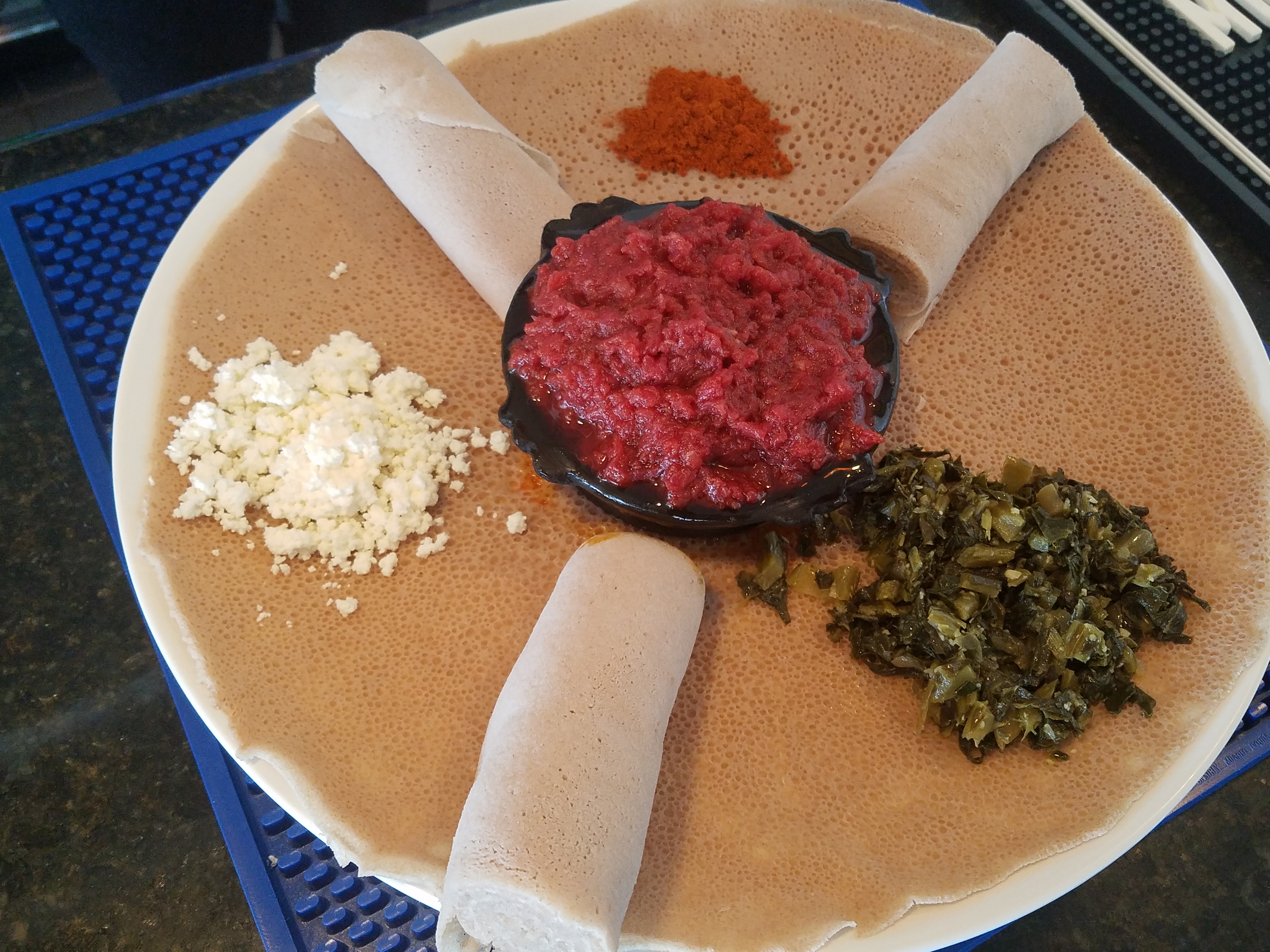 Order Kitfo food online from Shebelle Ethiopian Cuisine & Bar store, Dallas on bringmethat.com