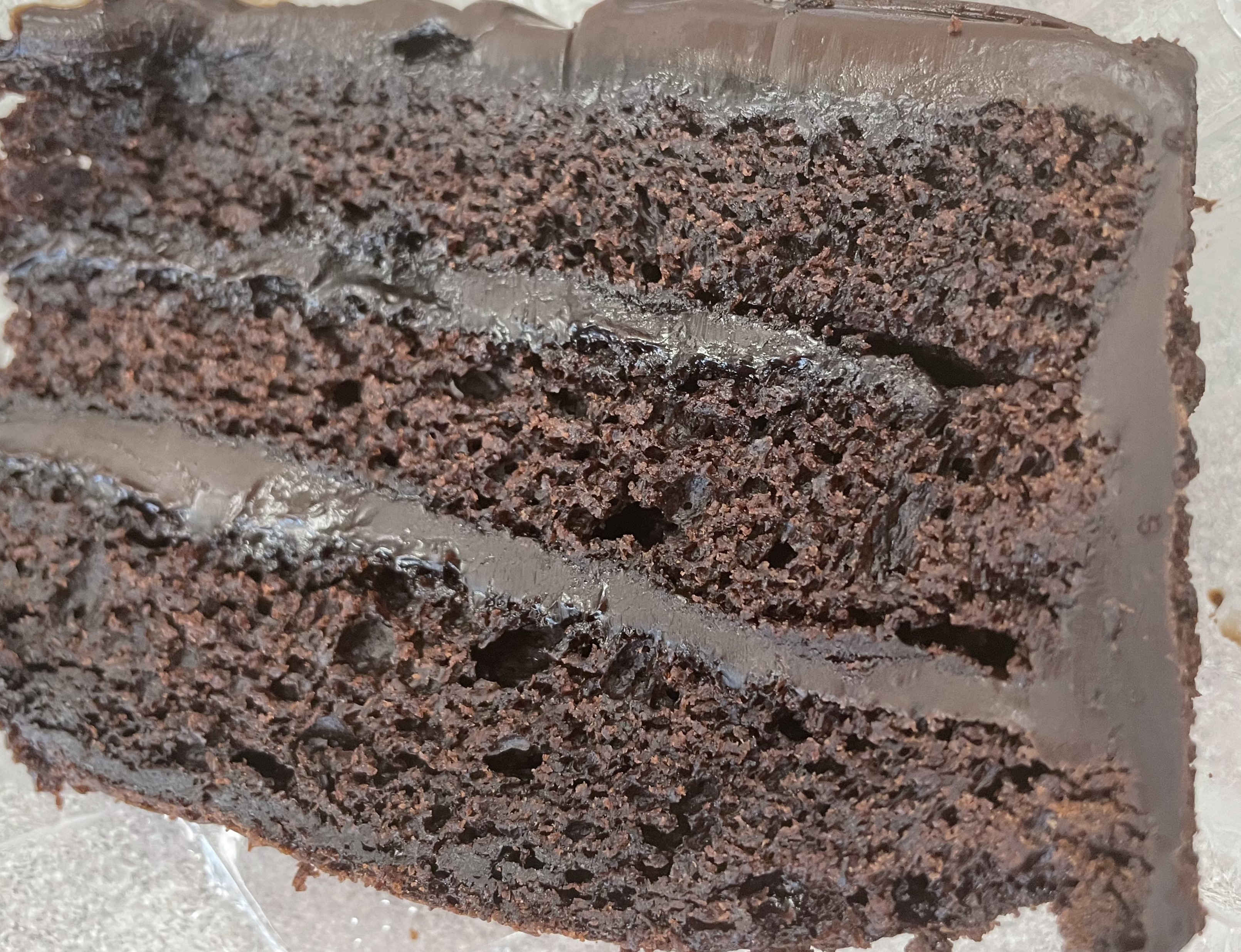 Order Triple chocolate cake food online from Cinelli Pizza And Italian Kitchen store, Rochester on bringmethat.com