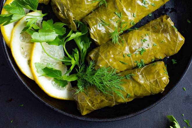 Order Grape Leaves (8 pcs) food online from Famous Gyro Bar store, Secaucus on bringmethat.com