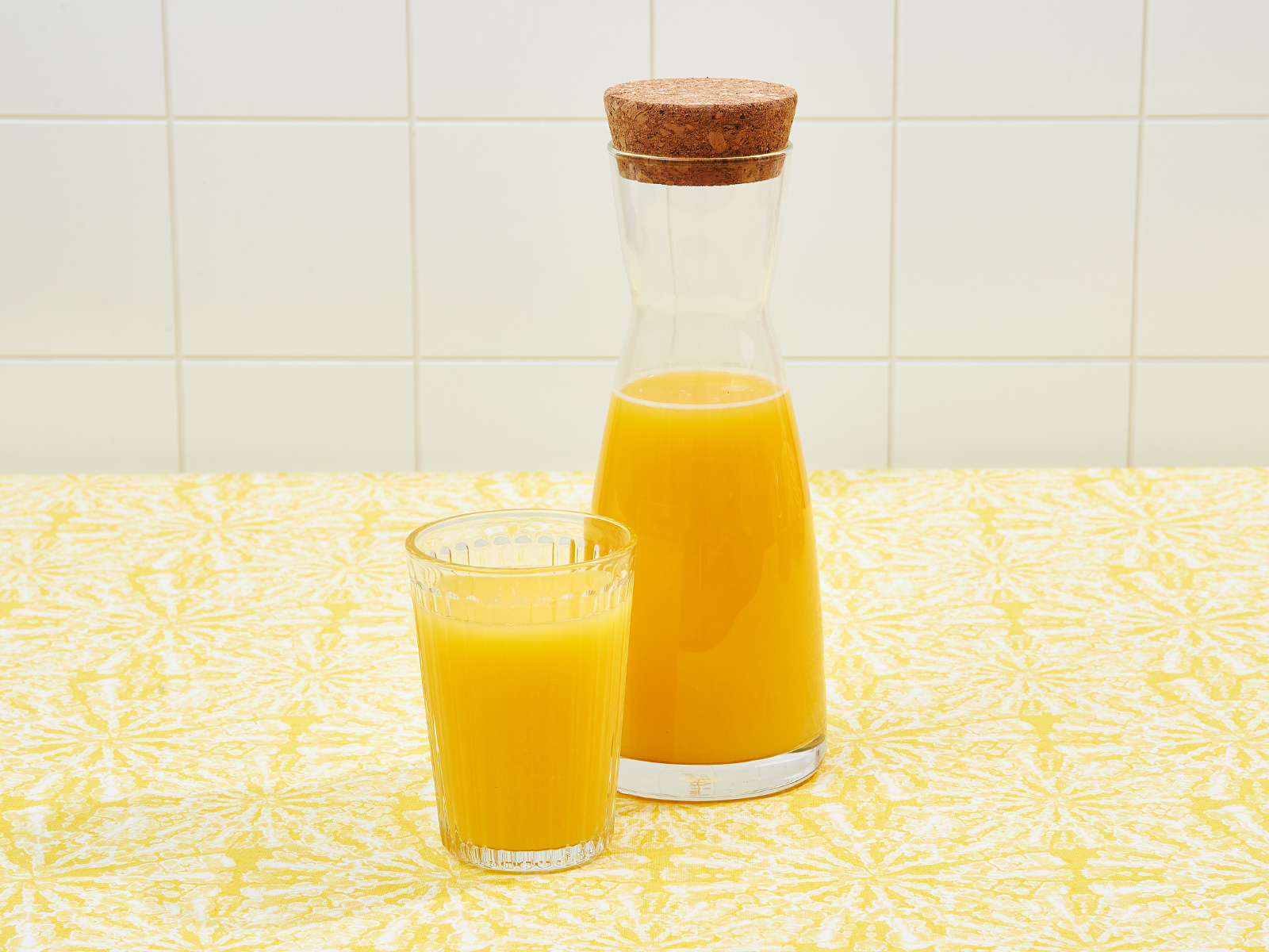 Order Orange Juice food online from Sunny & Fine's Breakfast Burritos store, Santa Monica on bringmethat.com