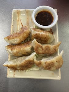 Order A5. Potstickers (6) food online from Panda House store, Sacramento on bringmethat.com
