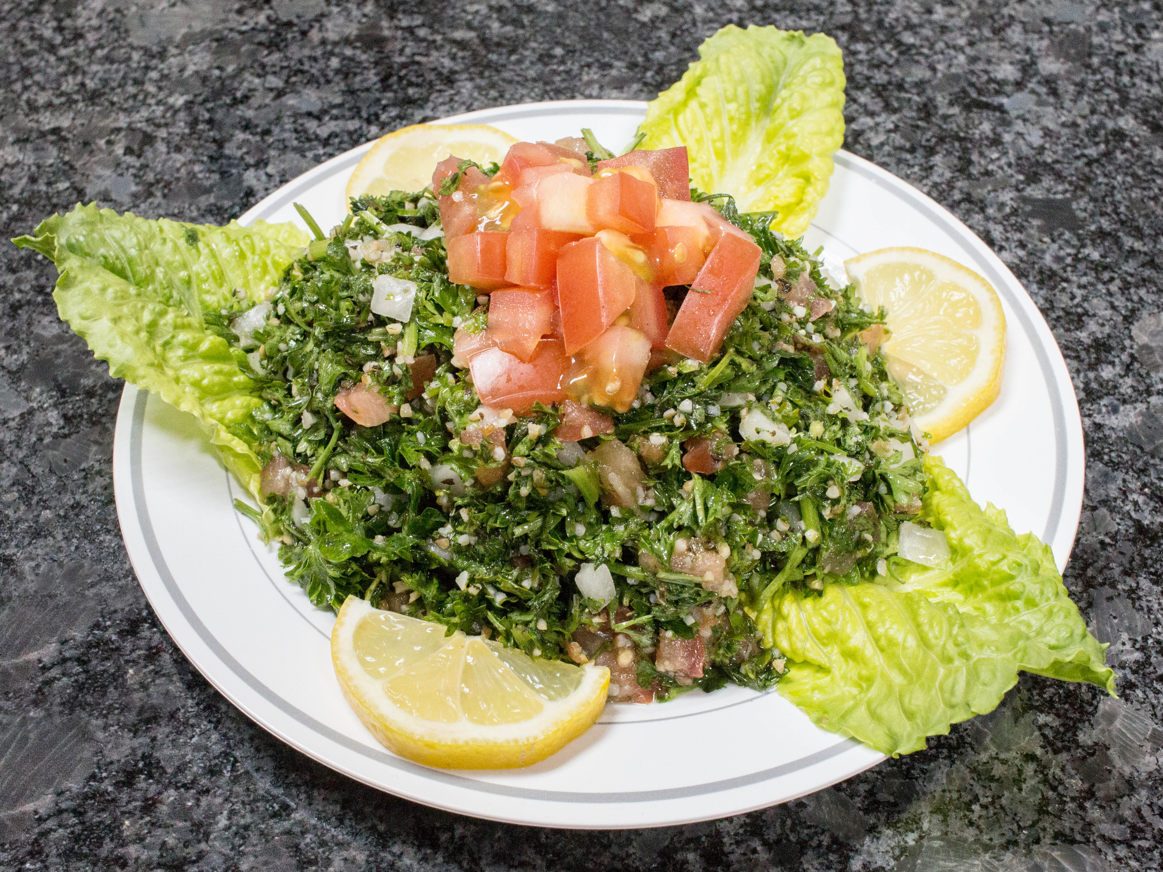 Order Tasty Tabbouli Salad food online from Mike's Kabob Grille Inc store, Detroit on bringmethat.com