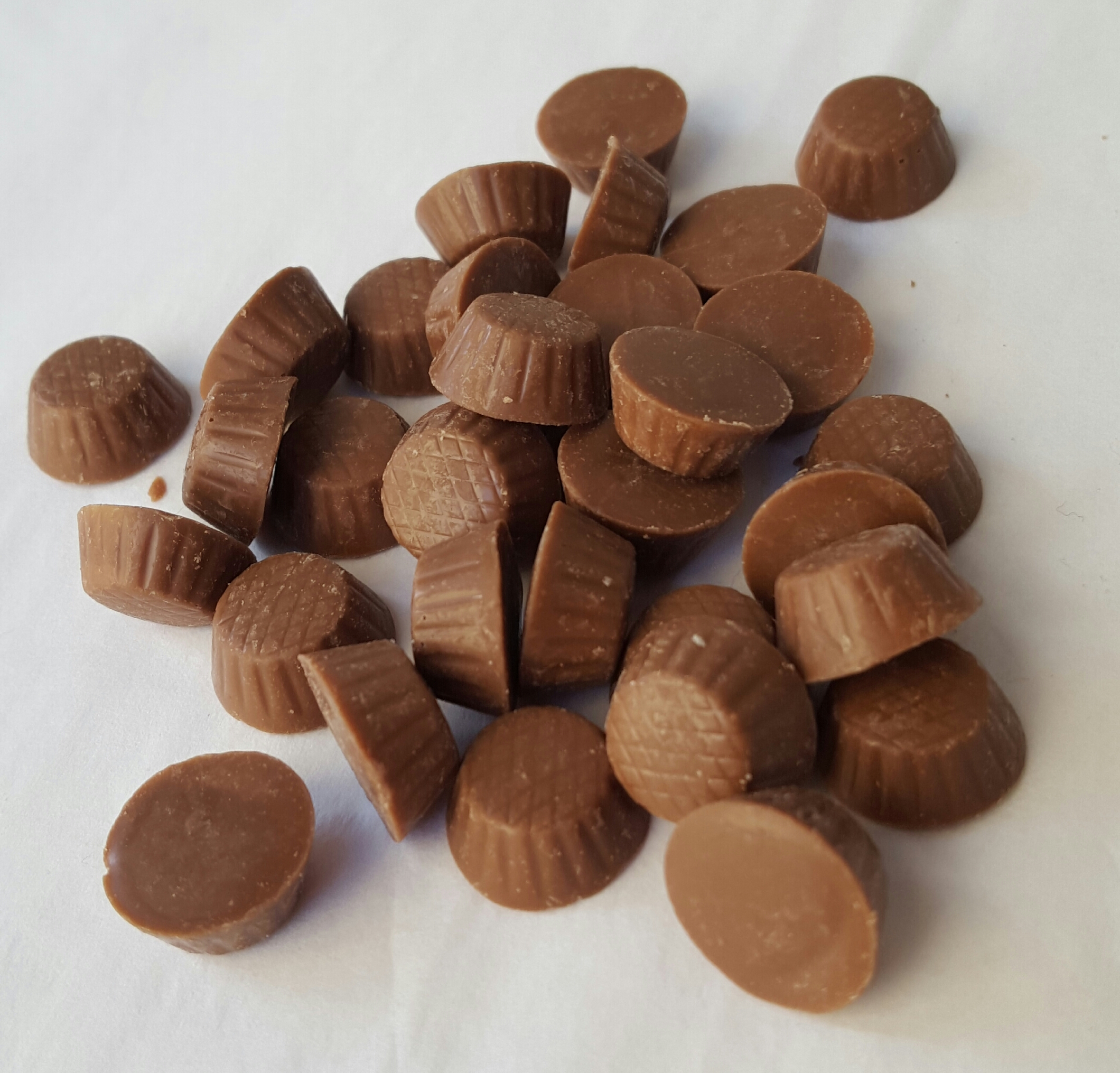 Order Mini Peanut Butter Cups in Milk Chocolate food online from St Moritz Chocolatier store, Pittsburgh on bringmethat.com