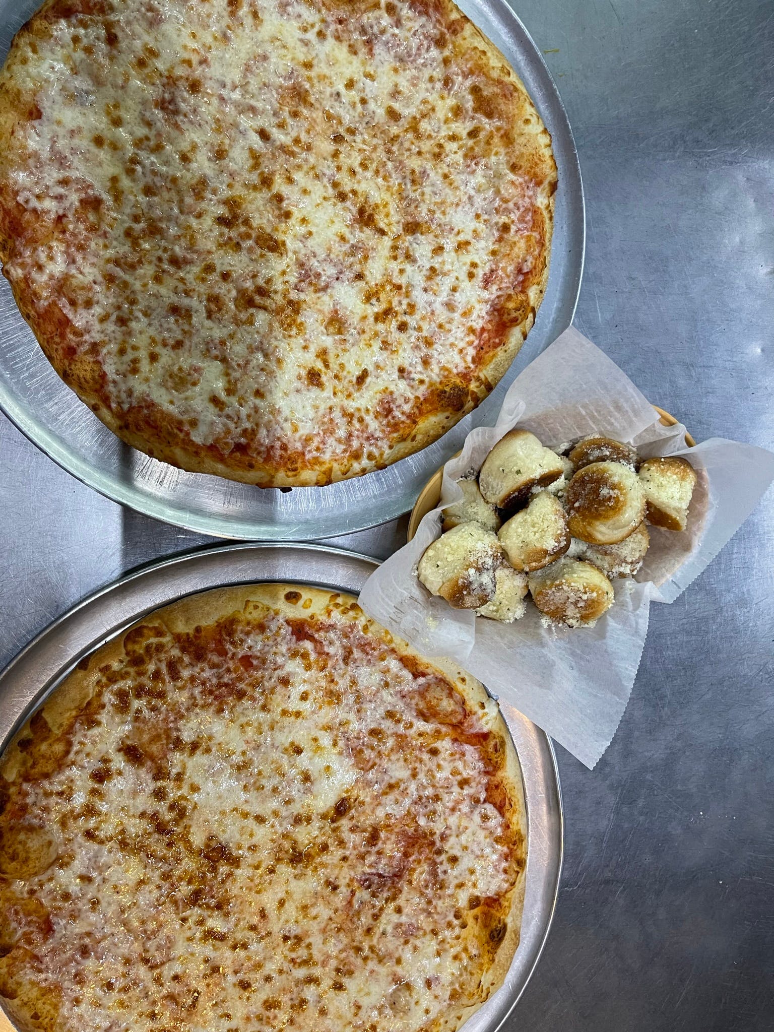 Order Two 16'' Large Pizzas with One Topping Each & Dozen Garlic Rolls Special - Special food online from Manhattan Chicago Pizza Kendall store, Miami on bringmethat.com