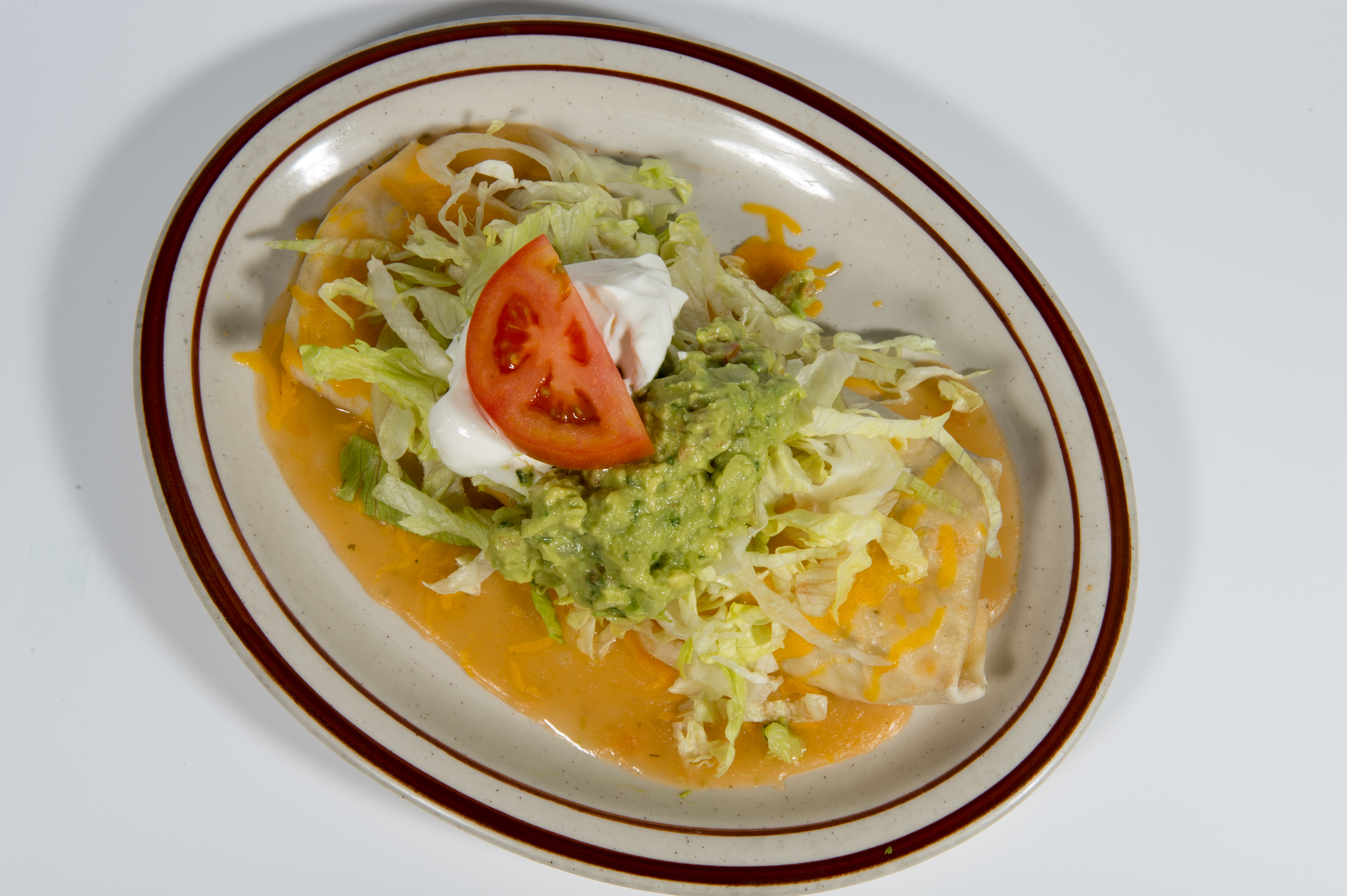 Order Burrito Deluxe food online from Fajitas Mexican Restaurant store, Clackamas on bringmethat.com
