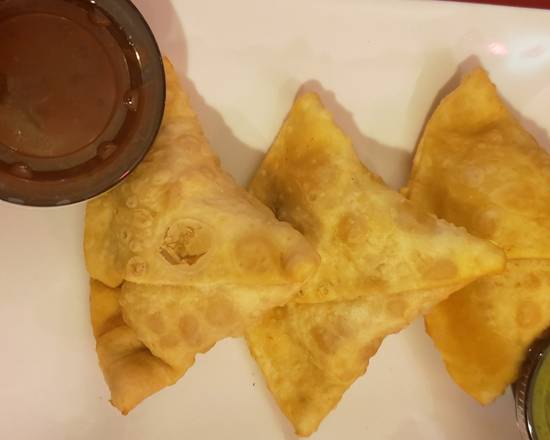 Order Chicken Samosa (2 pcs) & Chutney food online from Naan Cuisine Of India store, Oklahoma City on bringmethat.com