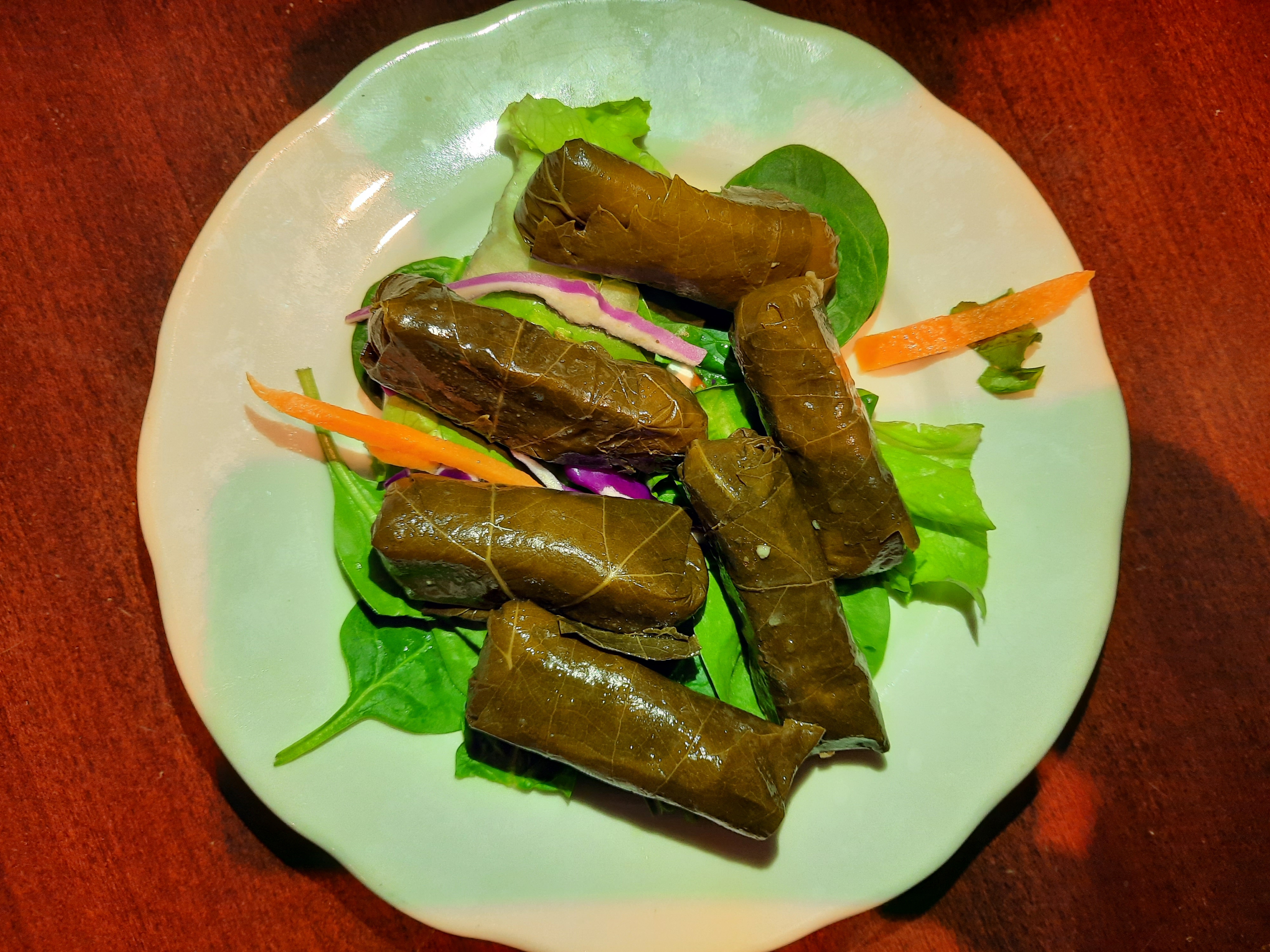 Order Stuffed Grape leaves w rice ( 6 piece) food online from Galaxy Diner store, New York on bringmethat.com