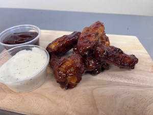 Order 12 BBQ Wings food online from Big O Pizza store, Anaheim on bringmethat.com