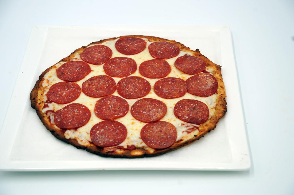Order *** NEW** GLUTEN FREE PIZZA 10" food online from Pizza Movers & Calzones store, Washington on bringmethat.com