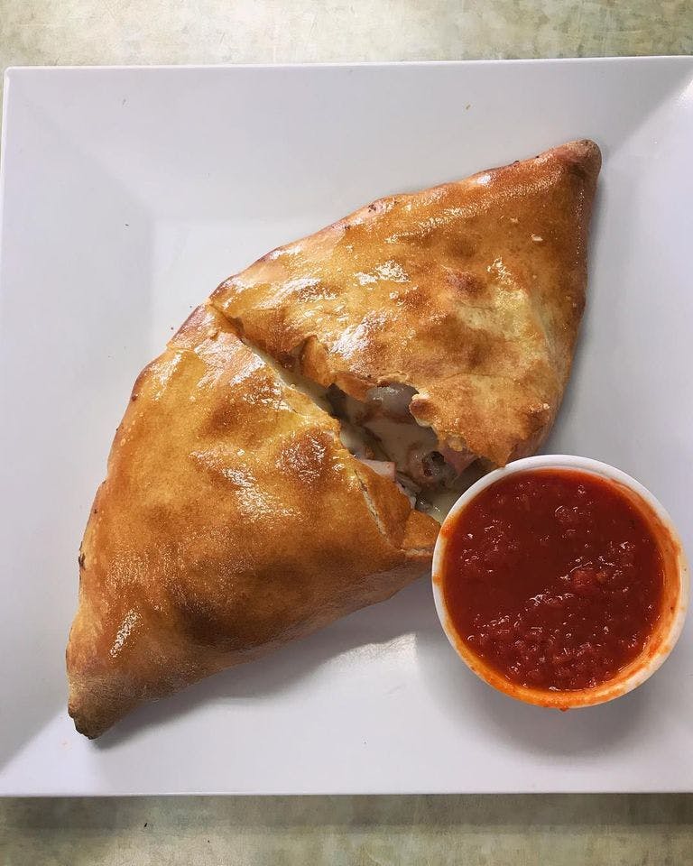 Order Create Your Own Calzone - Calzone food online from Carmelo's Pizza, Pasta, Subs & More!! store, Linthicum Heights on bringmethat.com