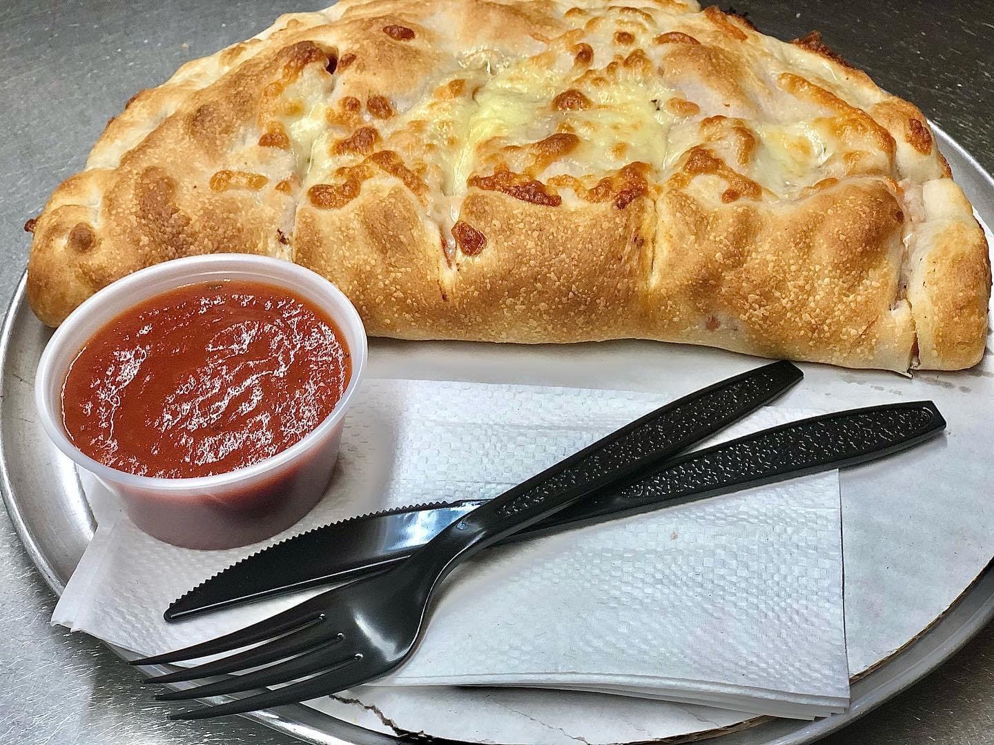 Order Buffalo Chicken Calzone - Calzone food online from Kelley Square Pizza store, Worcester on bringmethat.com