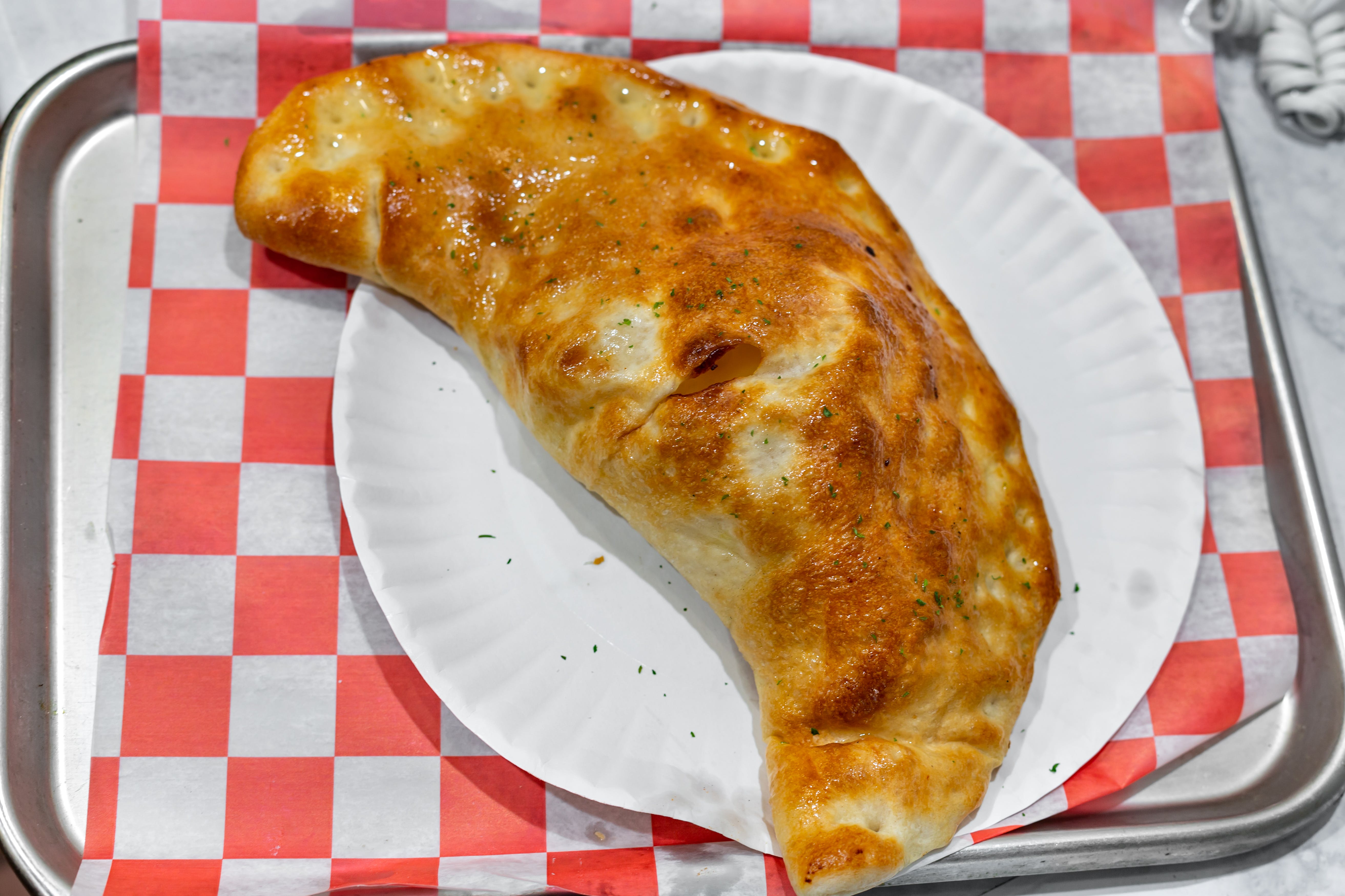 Order Calzone - Calzone food online from Port Jeff Pizza store, Port Jefferson on bringmethat.com