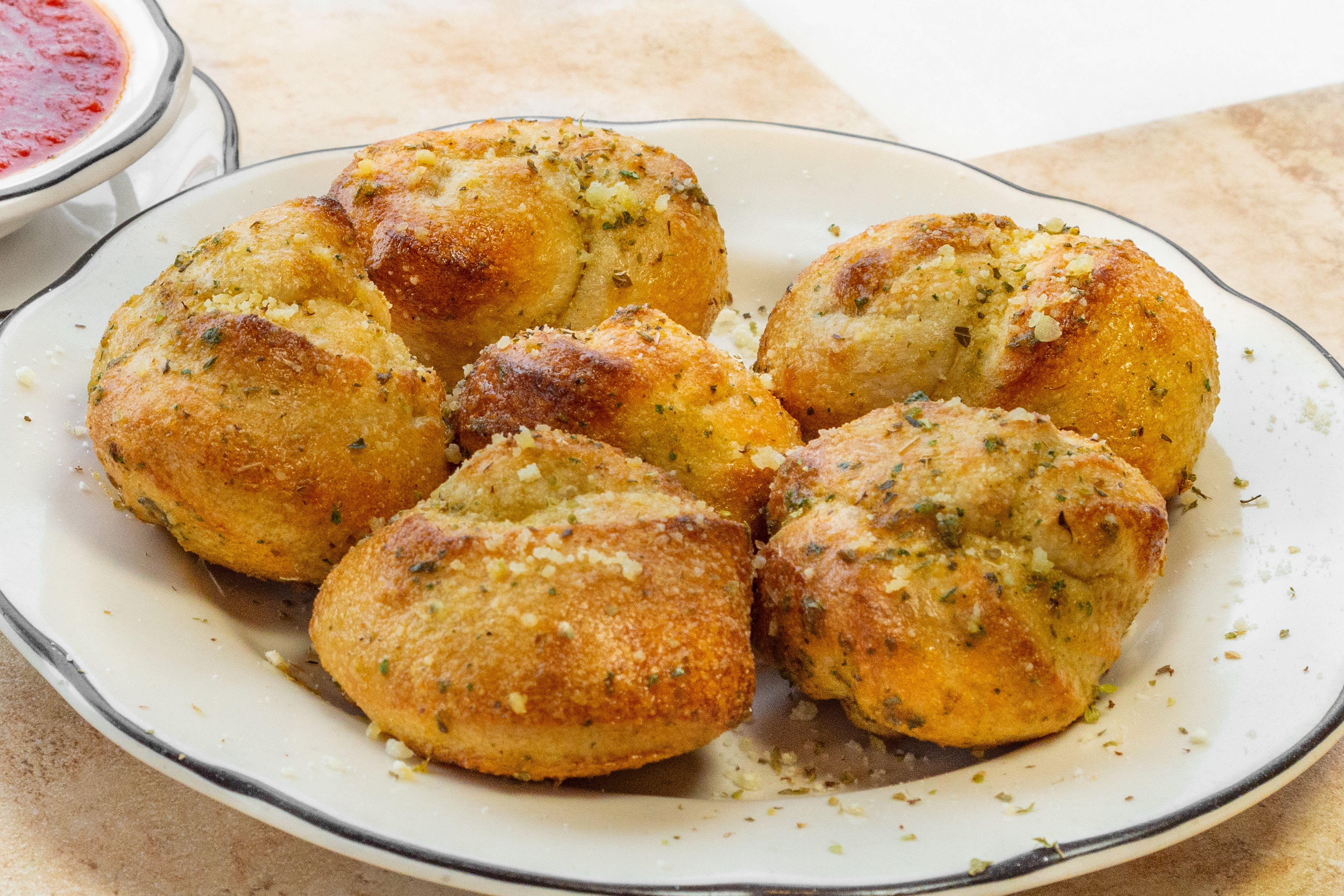 Order Garlic Knots - 6 Pieces food online from Brunos Pizza store, Gibsonia on bringmethat.com