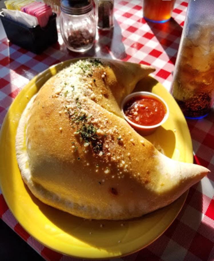Order Spinach Calzone - Calzone food online from Milantoni Italian Restaurant store, Bardstown on bringmethat.com