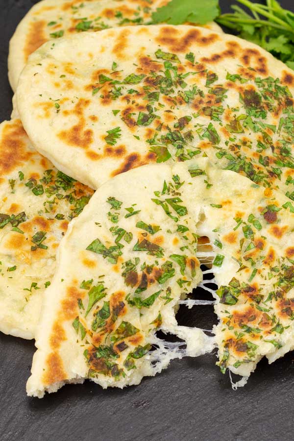 Order Cheesy Chilli Naan food online from Desi Chops store, Houston on bringmethat.com