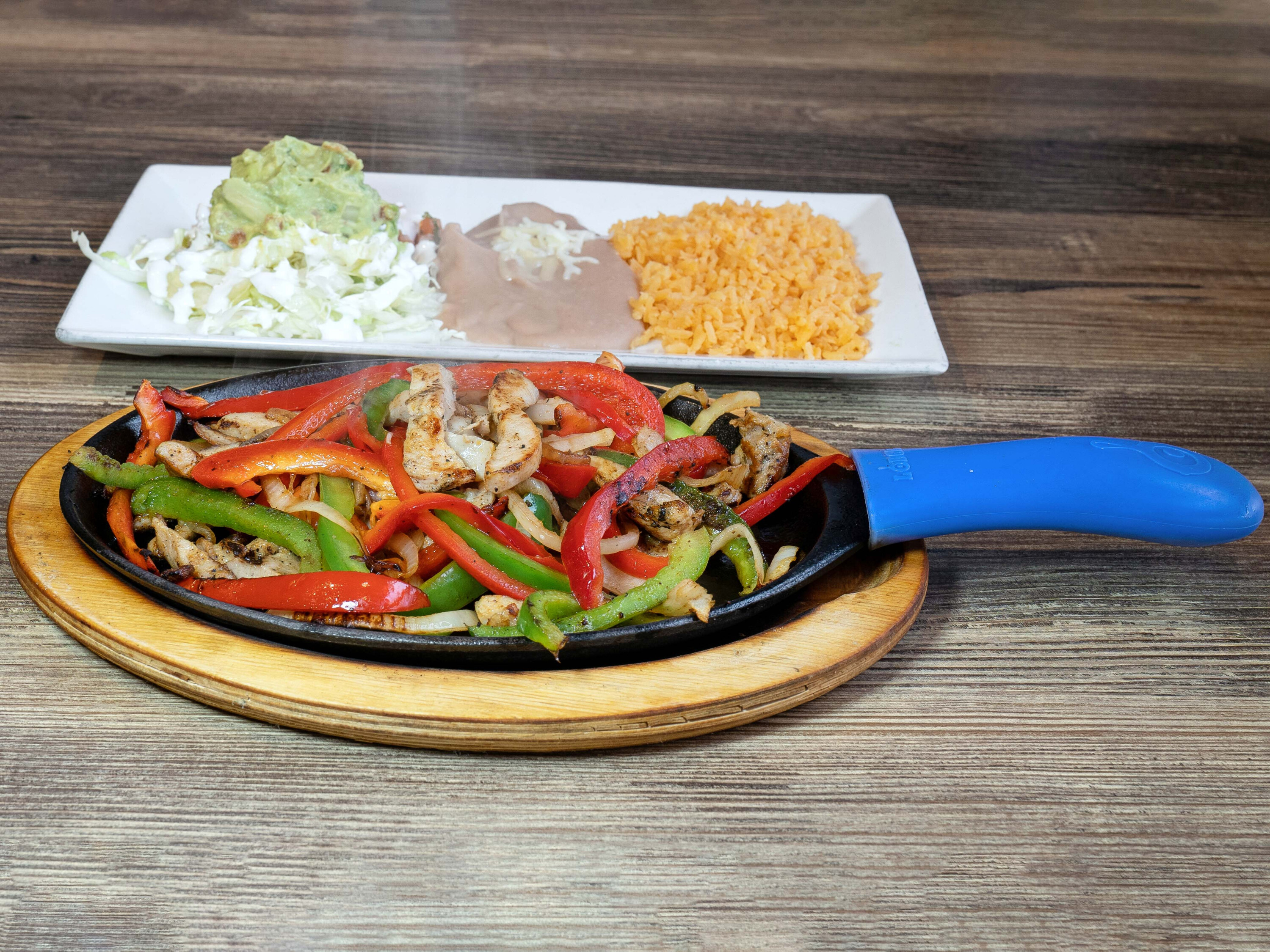 Order Steak and Grilled Chicken Combo Fajita food online from Jefa Tacos store, Aurora on bringmethat.com