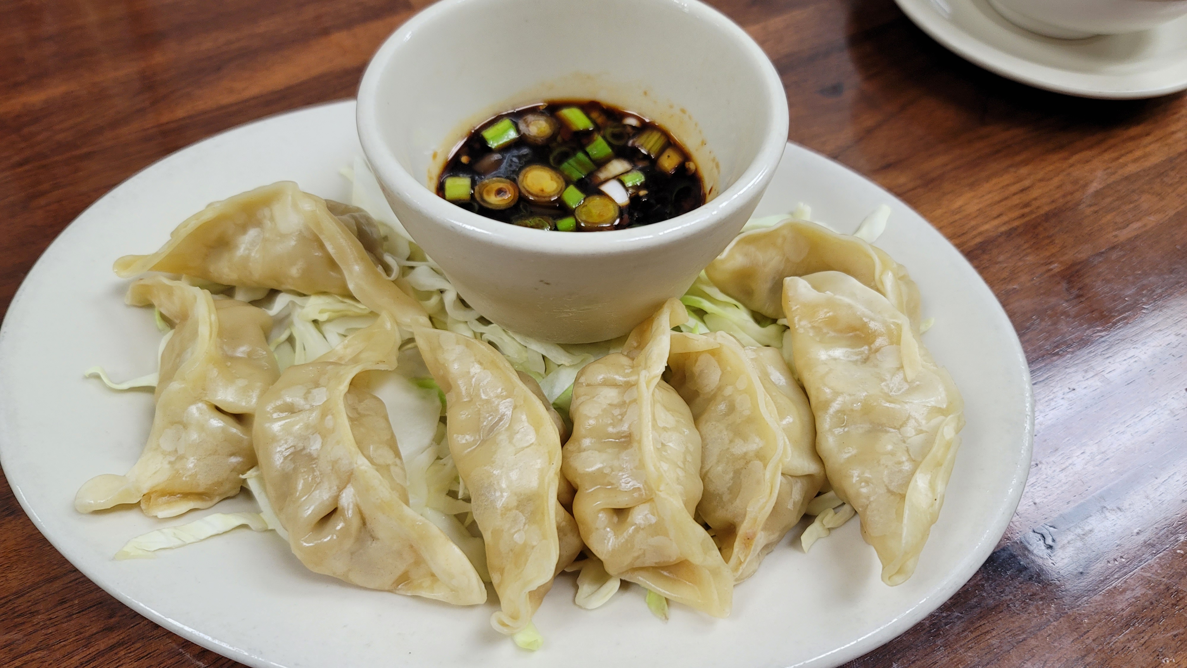 Order 8 Steamed Dumplings food online from China Cafe store, Austin on bringmethat.com