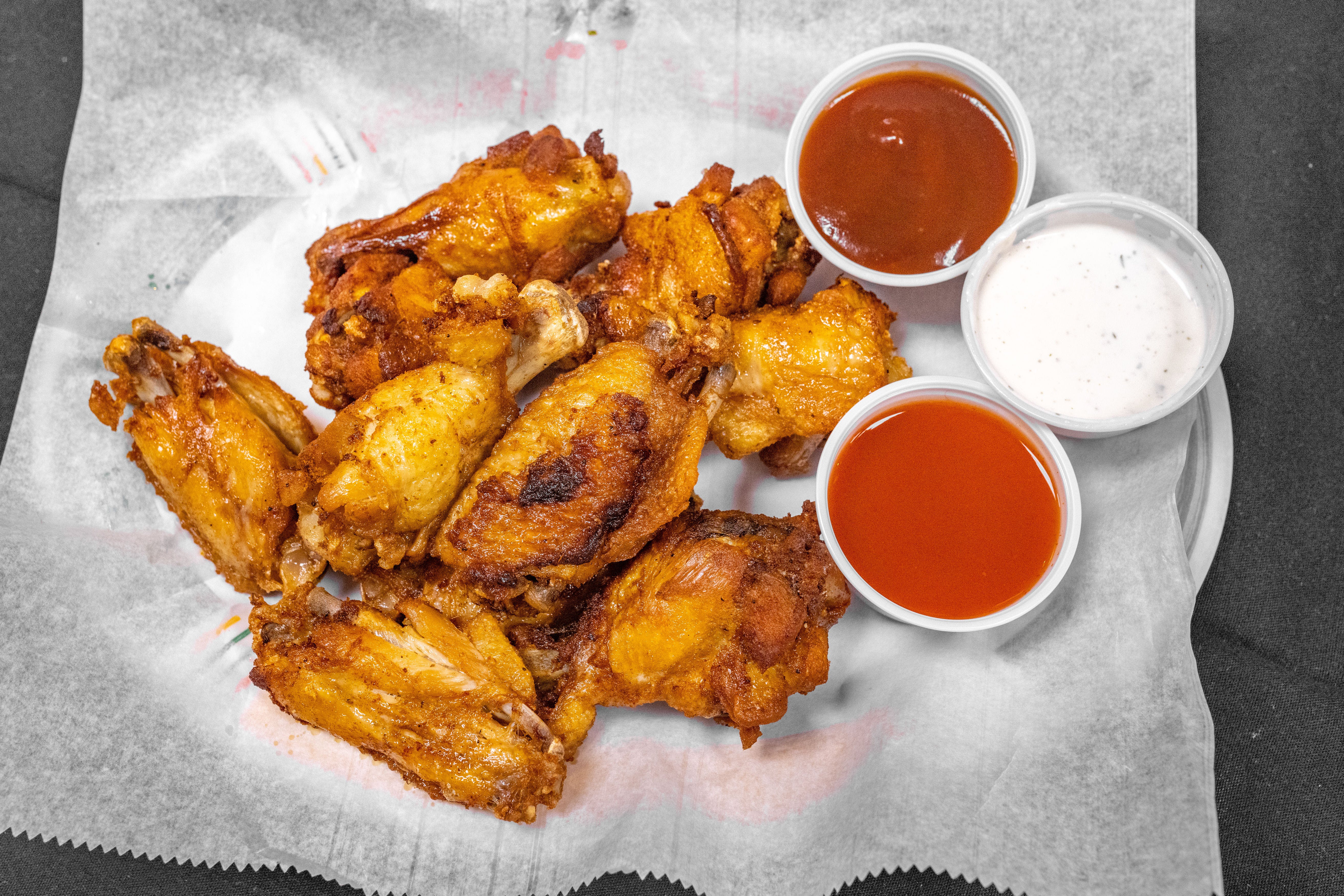 Order Buffalo Wings - 10 Pieces food online from Pollo Pizza Pasta store, Greensboro on bringmethat.com