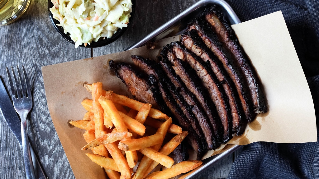 Order Texas Brisket Plate - Sliced food online from Red Hot & Blue store, North Richland Hills on bringmethat.com