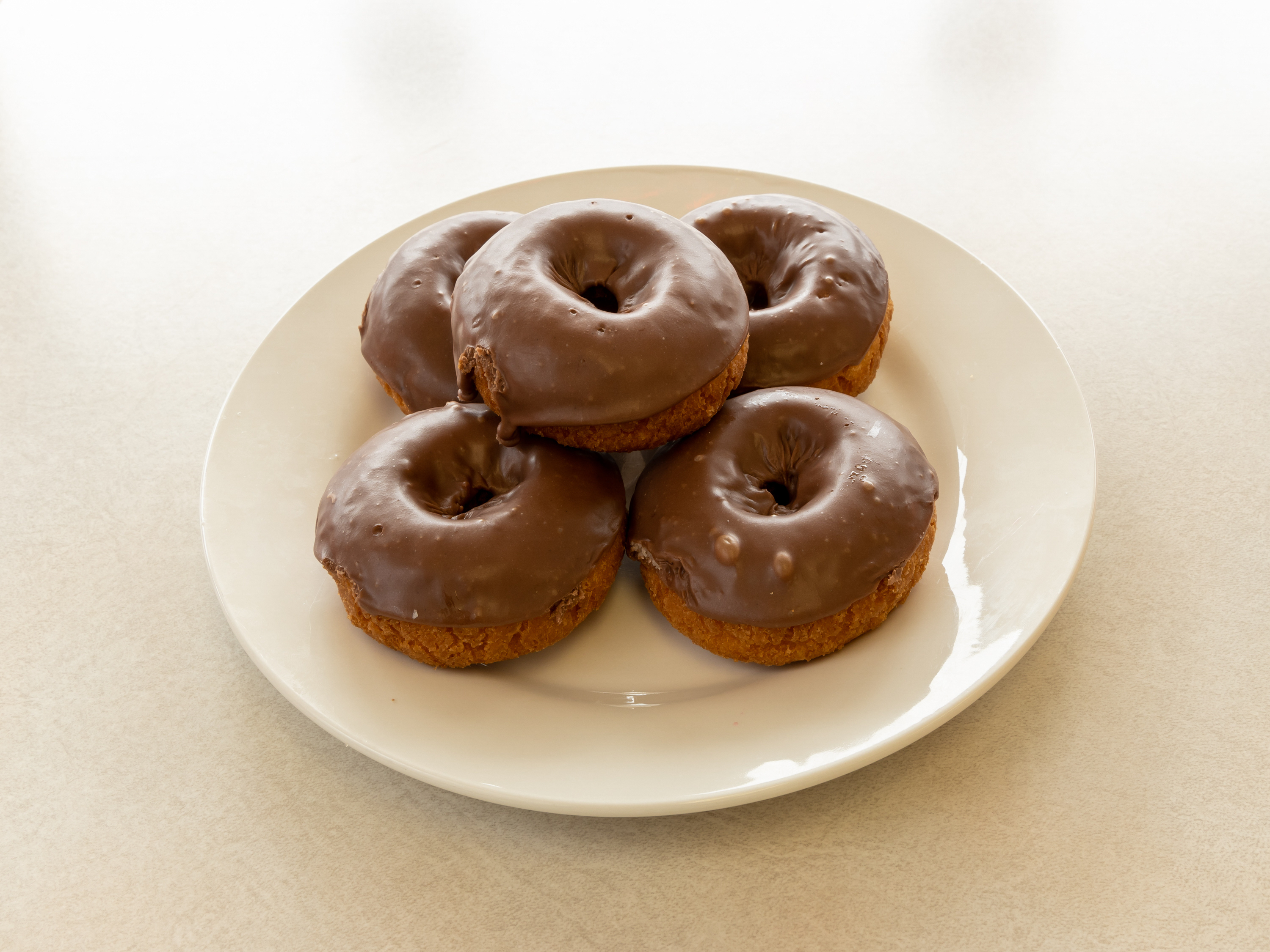 Order Chocolate Cake Donut food online from Mr. Donut And Kolache store, Jersey Village on bringmethat.com