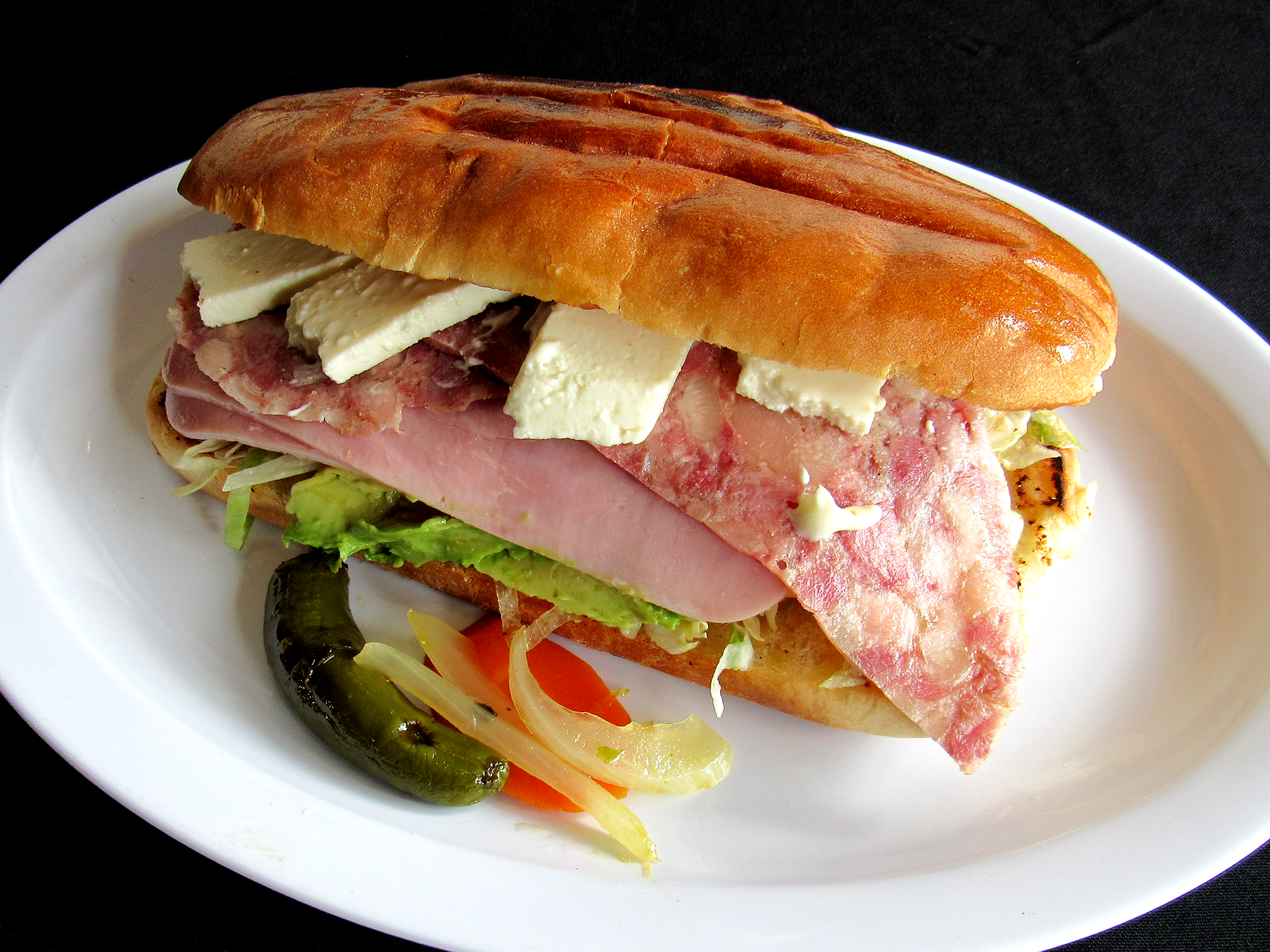 Order Chavo Torta food online from Alexander World Famous Tortas store, East Rancho Dominguez on bringmethat.com