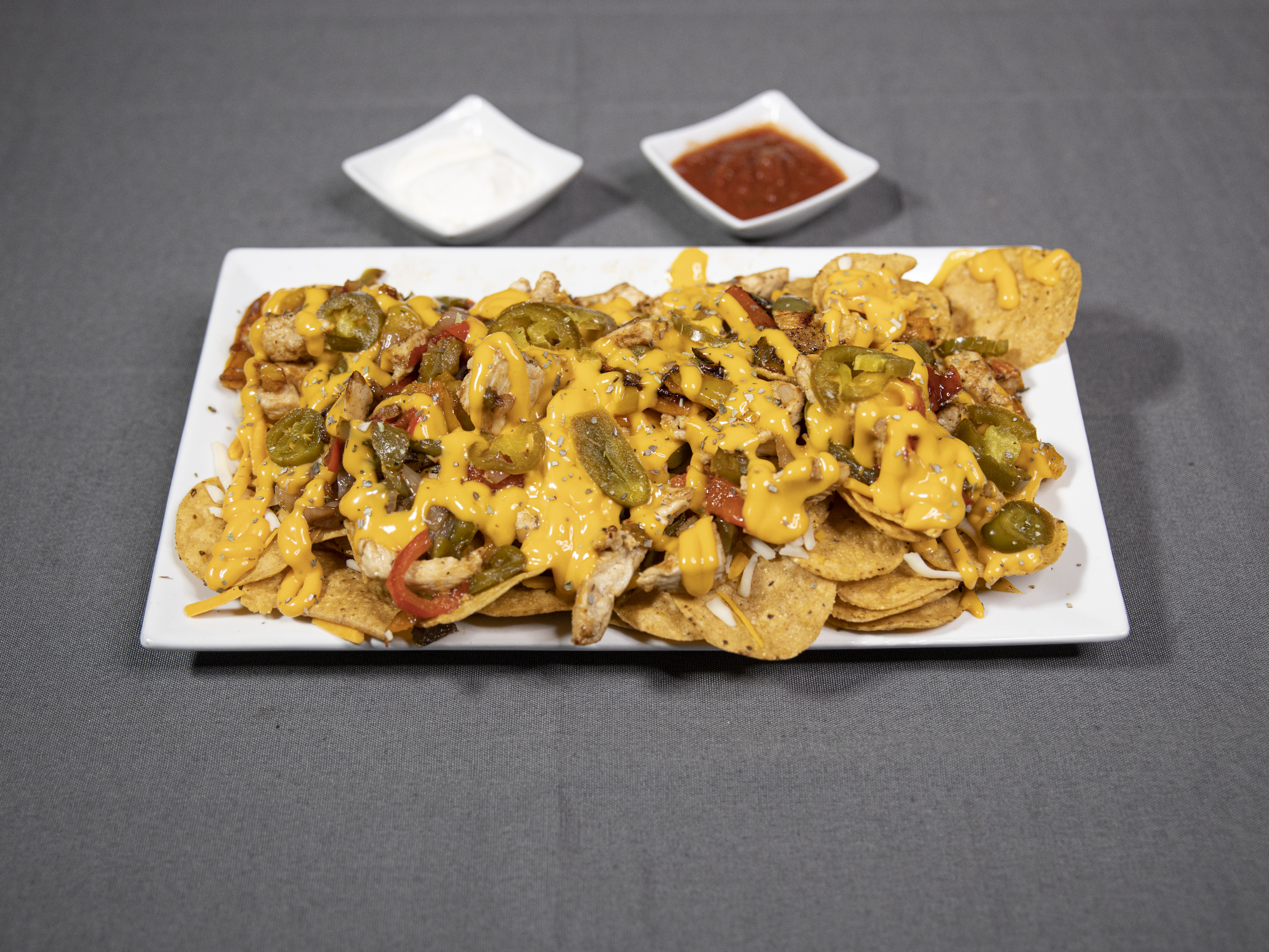 Order Loaded Nachos food online from Fusion Spice Bar & Grille store, Wilmington on bringmethat.com