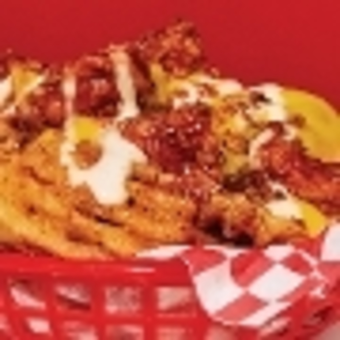 Order Cheesy Chicken Loaded Nachos: Waffle Fries food online from Wings Over Ithaca store, Ithaca on bringmethat.com