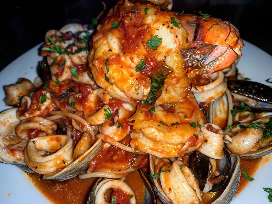 Order Seafood Combination food online from 3 Brothers Pizza Cafe store, Farmingdale on bringmethat.com