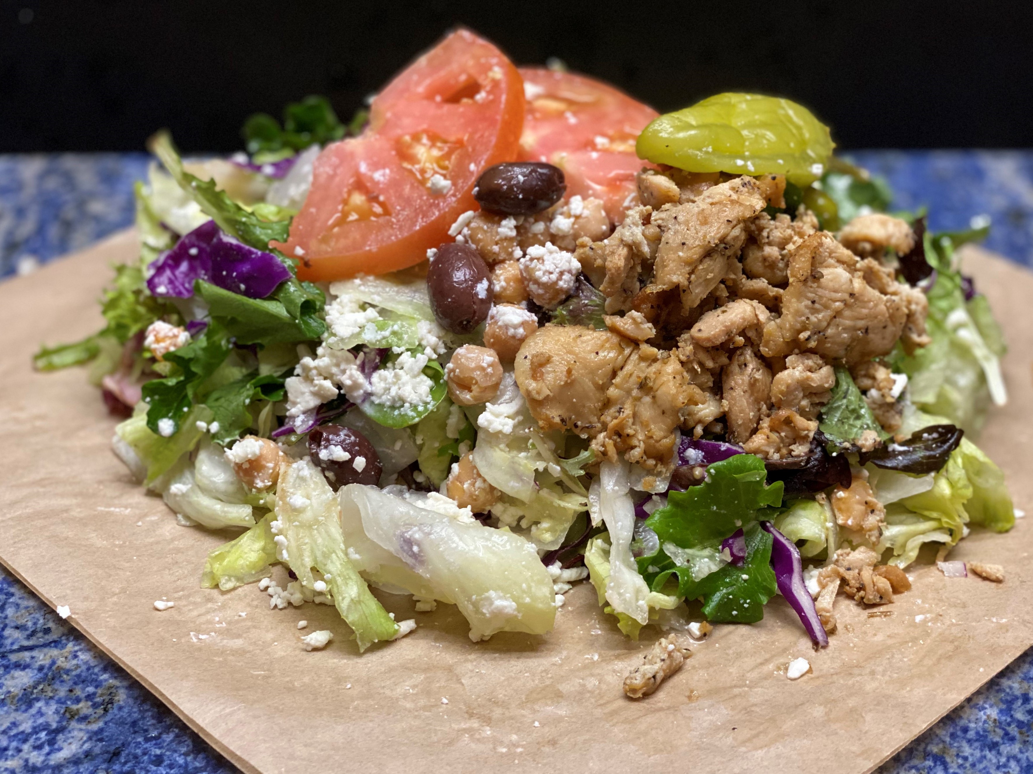 Order Grilled Chicken Salad or Gyro Salad food online from Gyro Breakers store, Henderson on bringmethat.com