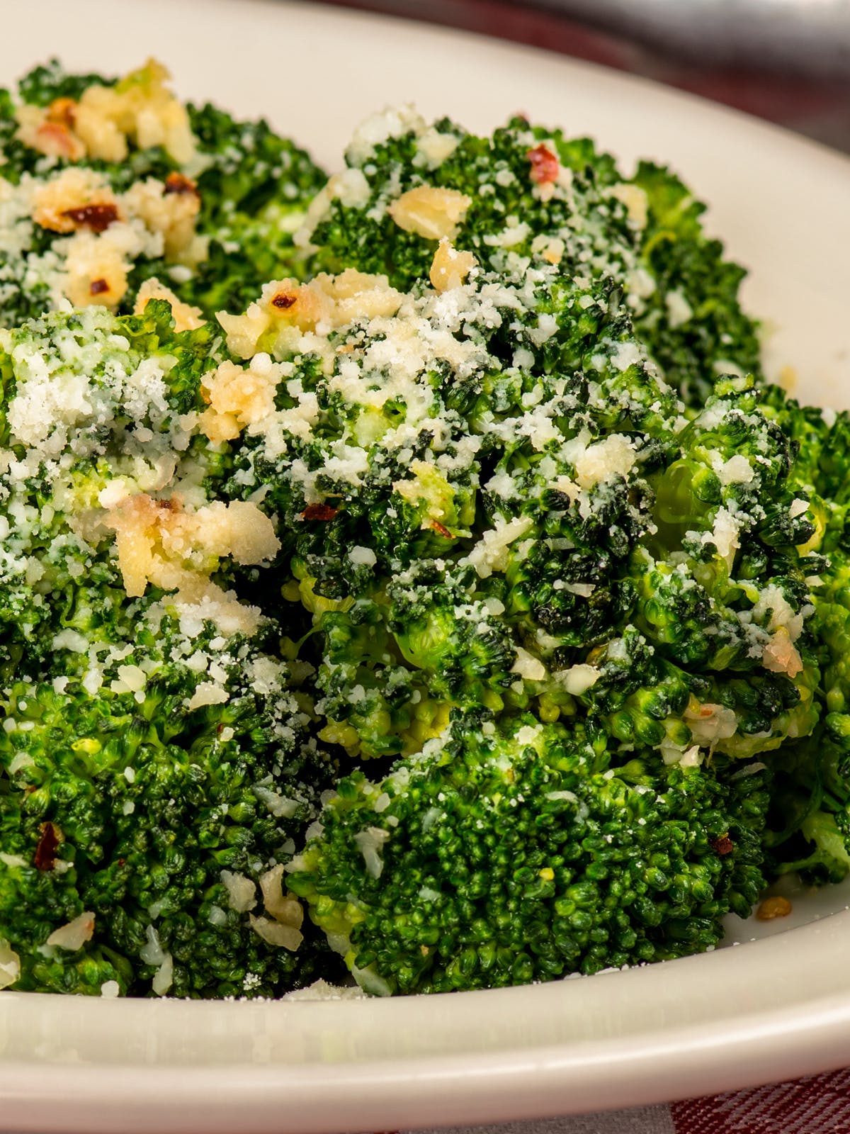 Order Italian Broccoli Romano - Side food online from Buca di Beppo store, Austin on bringmethat.com